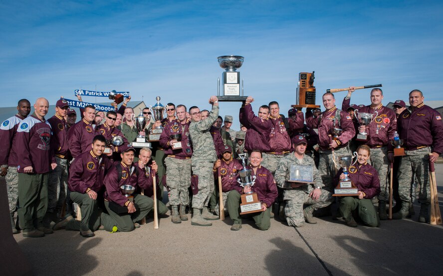 Airmen from the 91st Missile Wing pose with their trophies after returning from the Air Force Global Strike Challenge score posting on Barksdale Air Force Base, La.  Among their awards was the Blanchard Trophy, which is awarded to the best missile wing in the Air force. This was the second year in a row that Minot brought home the prestigious award. (U.S. Air Force photo/Senior Airman Stephanie Morris)