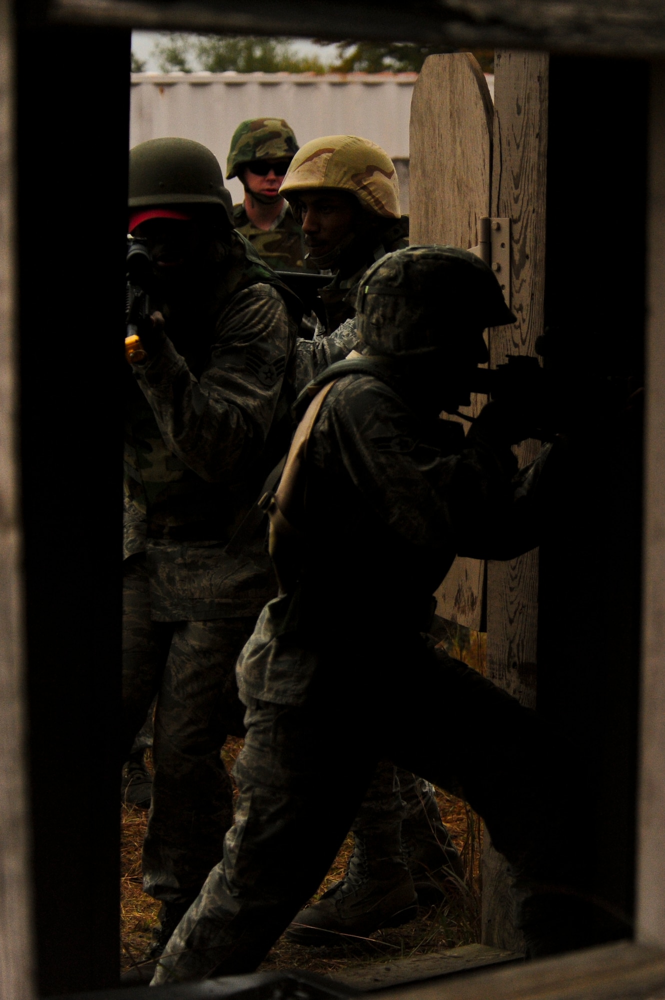 Airmen assigned to the 567th RED HORSE out of Seymour Johnson Air Force Base, North Carolina, practice building entry procedures during a field training exercise at Fort Smith, Arkansas, Nov. 5, 2014. The weeklong exercise, also featuring the 560th RED HORSE out of Joint Base Charleston, South Carolina, and Airmen out of the 4th Fighter Wing at Seymour Johnson AFB, is hosting 174 participants to provide upgrade training and prepare for an upcoming operation in support of Beyond the Horizon. Beyond the Horizon, conducted annually, is part of U.S. Army South and U.S. Southern Command’s humanitarian and civic assistance program, which works closely with host-nation forces and civilian organizations to provide medical, dental, and engineering support. (U.S. Air Force photo/Airman 1st Class Brittain Crolley)