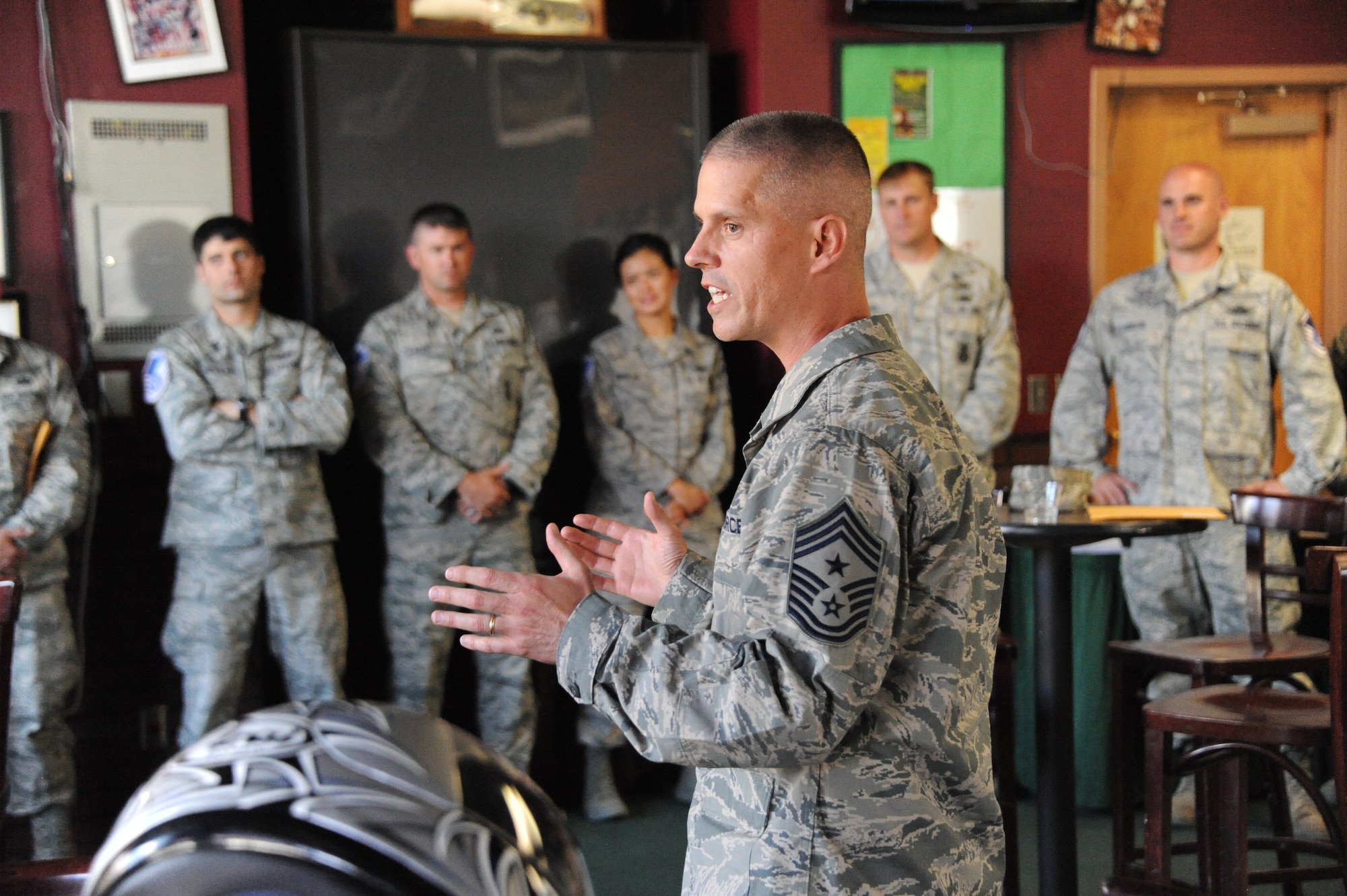 Chief Master Sgt. John Dougherty, command chief for the 377th Air Base Wing and Air Force Nuclear Weapons Center, speaks to Airmen at an event earlier this year. The chief, who is retiring after 30 years of military service, including the last two and a half years at Kirtland, said the best part about his job was his ability to take care of Airmen. (Photo by Todd Berenger)