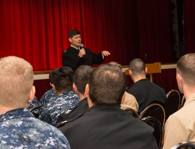 Chief of Naval Personnel, Vice Adm. Bill Moran, tells Sailors to be open and speak with their leadership at an All Hands Call Nov. 7 at Joint Base San Antonio-Lackland. Sailors from across JBSA had the opportunity to ask questions directly to the CNP. Some topics included uniform requirements, shorter deployments, pay and benefits, the loan repayment program, transitioning to a civilian career, and the growing naval force. (U.S. Air Force photo by Airman Justine Rho/released).