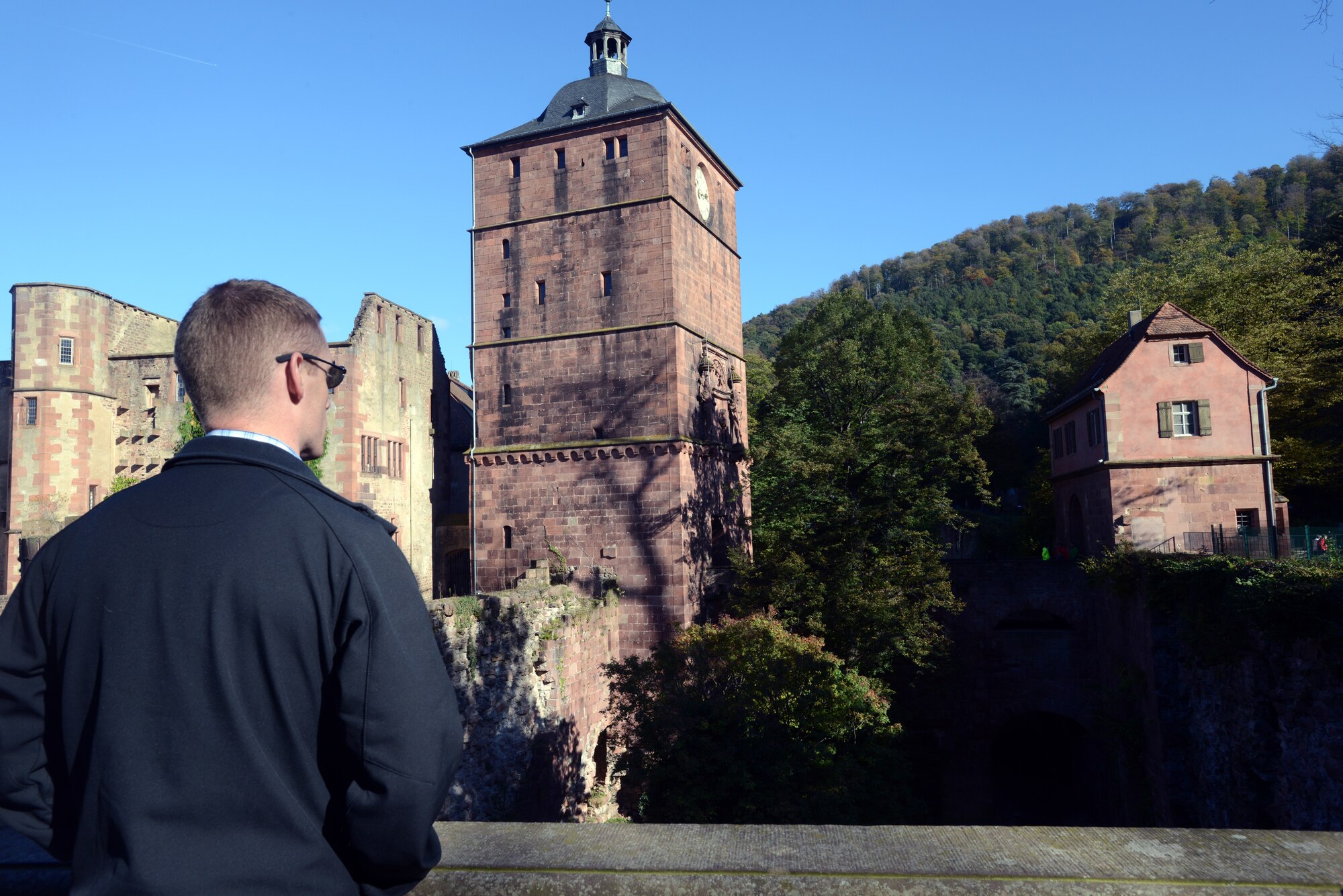 A redeployer going through the Air Force Deployment Transition Center gazes over the landscape at the Heidelberg Castle in Heidelberg, Germany, Oct. 24, 2014. Redeployers go on an experiential outing during their time at the DTC to help them transition back into less threatening environments before going back home. (U.S. Air Force photo/Senior Airman Timothy Moore)