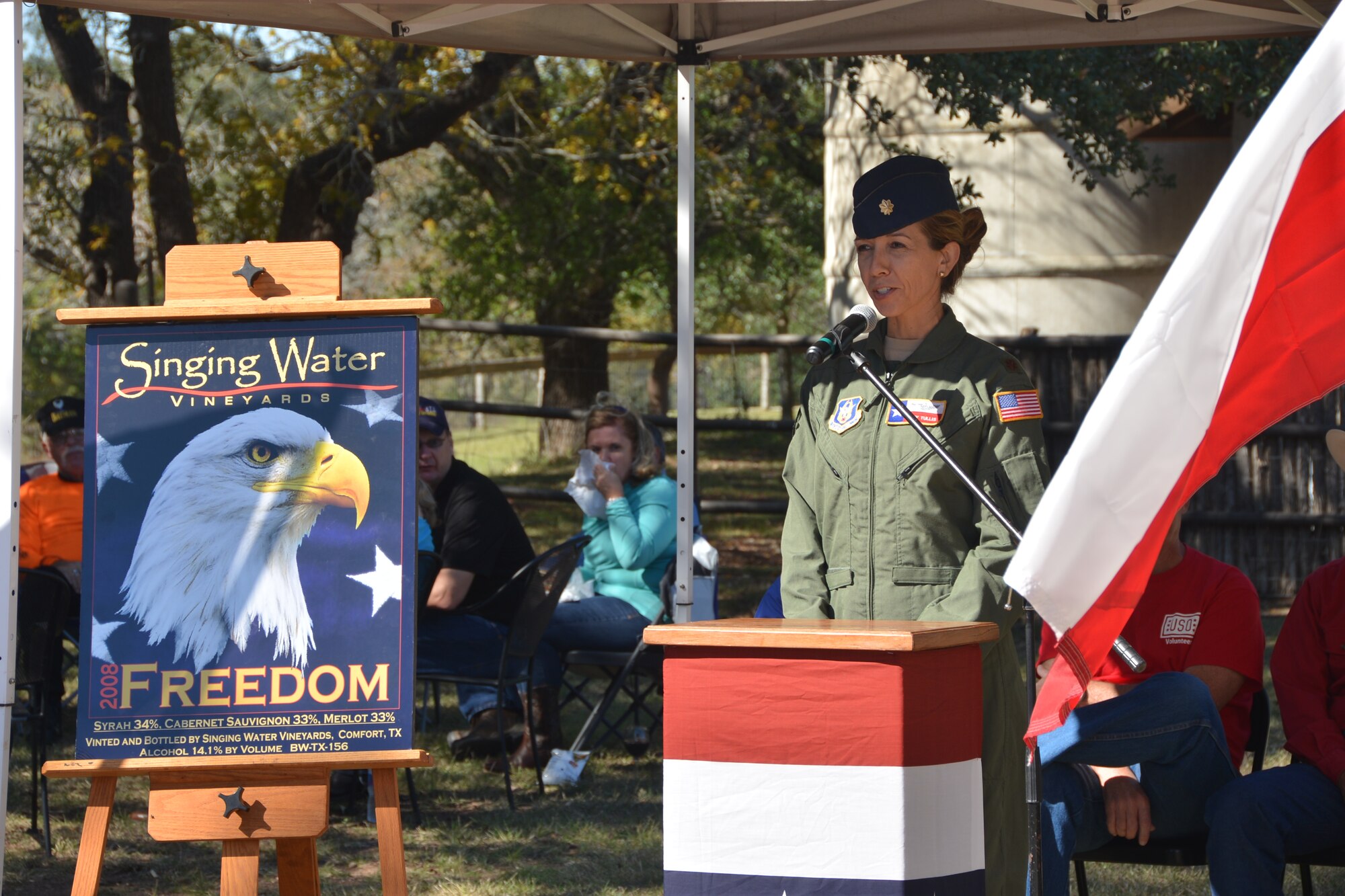 Air Force Major Amy Tullis, 433rd Airlift Wing, pilot speaks at a Veterans’ Freedom Day luncheon, Nov. 8, 2014 at the Singing Waters Vineyards in Comfort, Texas. Tullis was invited to speak at the event and talk about her career in the Air Force Reserve. “I'm always overwhelmed at the support here in San Antonio, when I go out in public in my uniform, people always come up to me and thank me for my service, said Tullis. "It's honor and a pleasure to serve this country.”