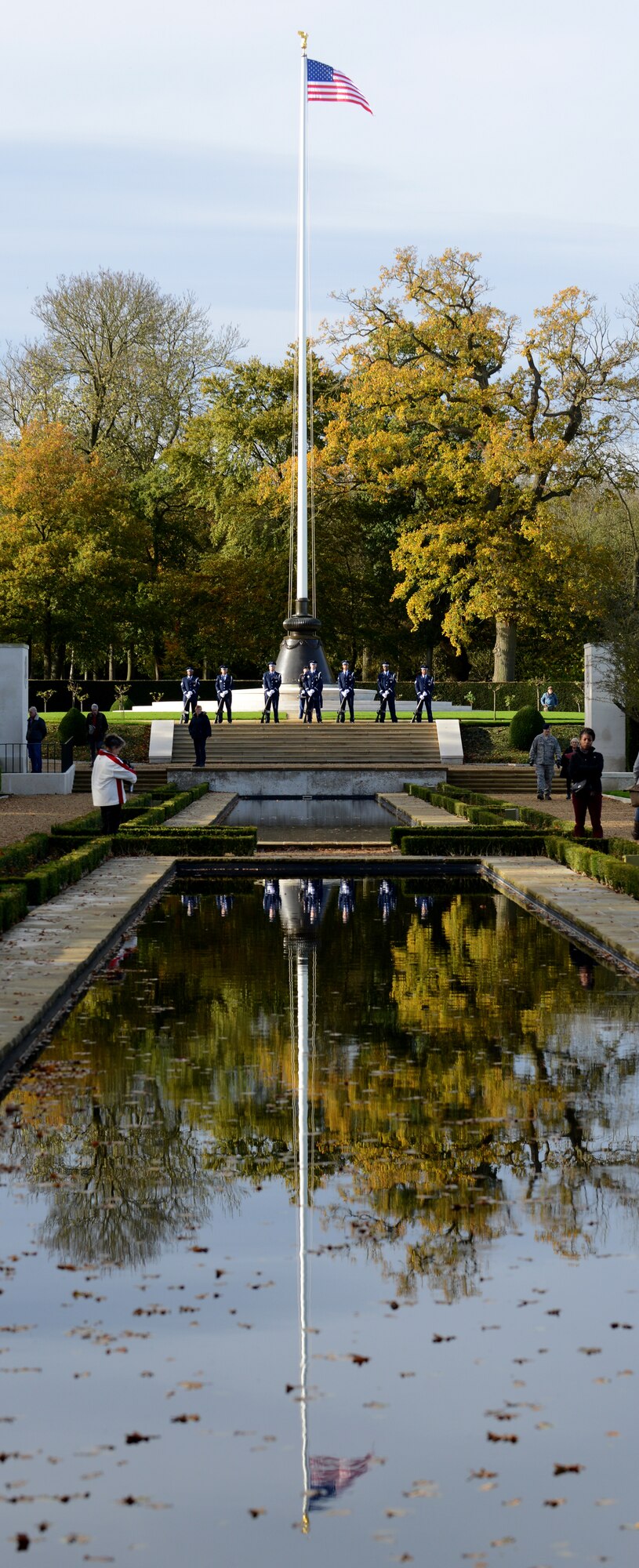 U.S. Air Force Airmen from the 423rd Air Base Group Honor Guard stand at
parade rest prior to firing a volley during a Veterans Day ceremony at
Cambridge American Cemetery, United Kingdom, Nov. 11, 2014. The ceremony
honored both the 3,812 American Service members buried at the cemetery,
along with veterans, past and present. (U.S. Air Force photo by Tech.
Sgt. Chrissy Best/Released)
