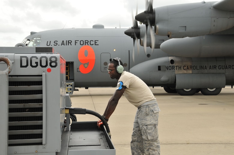 U.S. Air Force Senior Airman Jordan Shelton, Crew Chief for the 145th Aircraft Maintenance Squadron, North Carolina Air National Guard, monitors a power unit for the C-130 Hercules aircraft during pre-flight inspections.  Shelton will also marshal and launch the MAFFS 9 aircraft and its crew as they depart the NCANG base, Charlotte-Douglas Intl. Airport and head to the National Interagency Fire Center in Boise, Idaho.  The 145th Airlift Wing returns to flying Modular Airborne Fire Fighting System missions, August 20, 2013. (U.S. Air National Guard photo by Master Sgt. Patricia Findley Moran/Released)