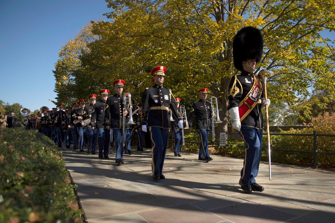 The Army Band departs the Tomb of the Unknowns following a Veterans Day ceremony at Arlington National Cemetery in Arlingoton, Va., Nov. 11, 2014.