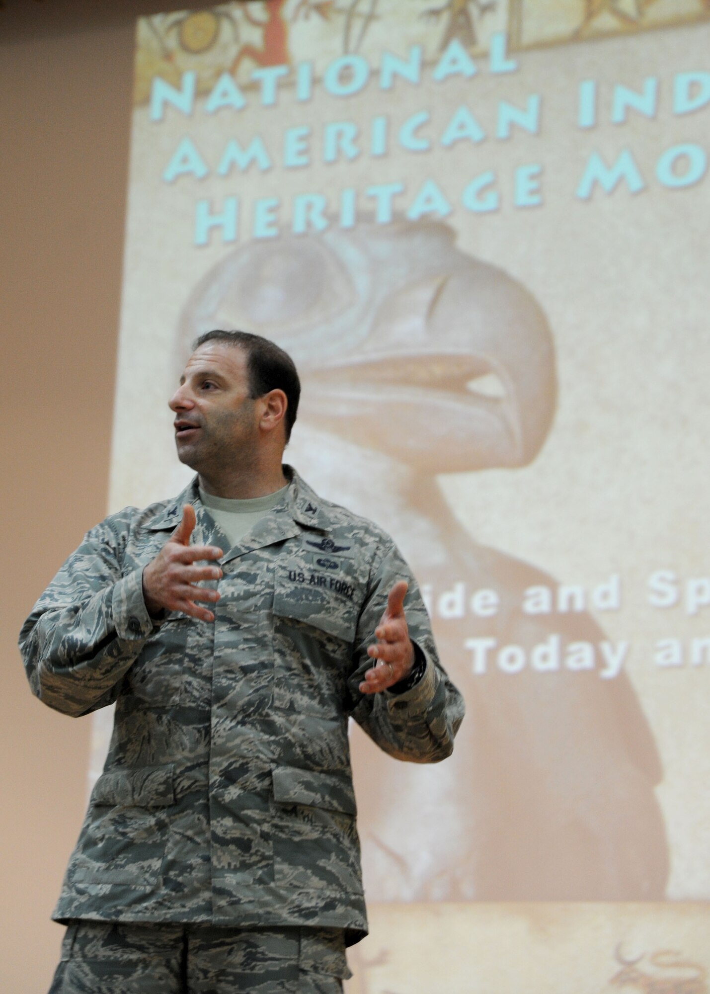 Col. Jason Hanover, 386th Air Expeditionary Wing commander, explains the value of diversity to Airmen during a Native American Heritage Month observance ceremony here Nov. 5, 2014. This year’s Native American Heritage Month theme is, “Native Pride and Spirit: Yesterday, Today and Forever,” and the observance promotes the value of Native American ancestry and traditions. (U.S. Air Force photo by Master Sgt. Eric Petosky/released)