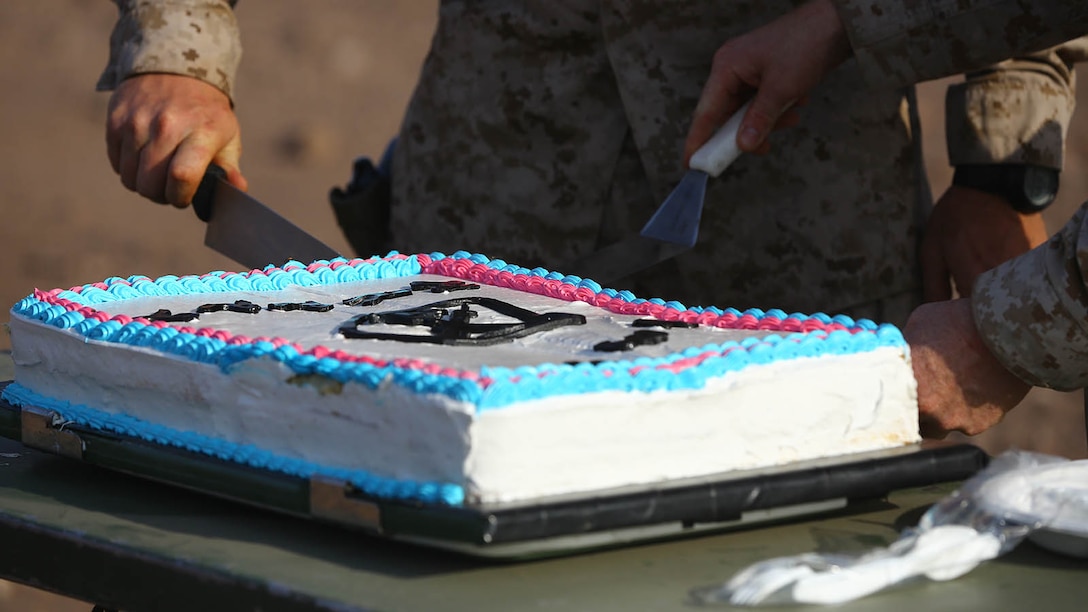 U.S. Marines with the 11th Marine Expeditionary Unit (MEU), cut the ceremonial cake for the 239th birthday of the United States Marine Corps during sustainment training in D'Arta Plage, Djibouti, Nov. 10. The 11th MEU is deployed as a theater reserve and crisis response force throughout U.S. Central Command and 5th Fleet area of responsibility. 