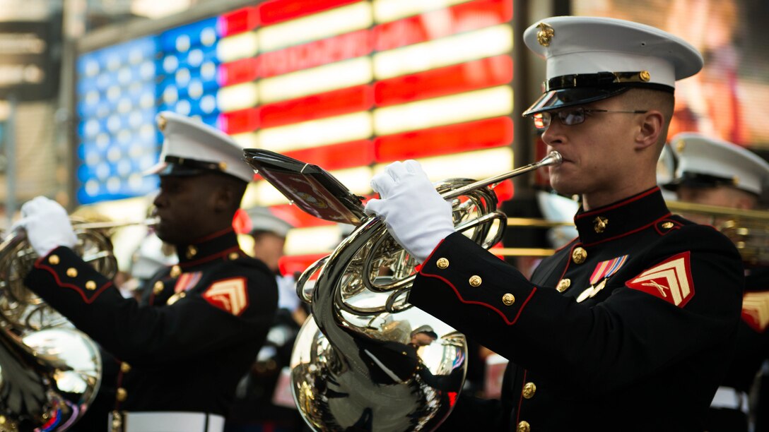 The Quantico Marine Corps Band, from Marine Corps Base Quantico, Virginia, performed at Times Square in New York City with more than 1,000 high school student for the Band of Pride Tribute Concert on November 10, 2014. The bands drew crowds of people who listened, rendered salutes, and took photos and video of the performance.