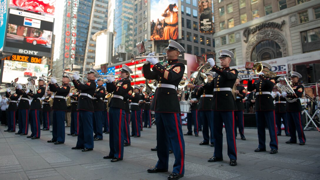 The Quantico Marine Corps Band, from Marine Corps Base Quantico, Virginia, performed at Times Square in New York City with more than 1,000 high school student for the Band of Pride Tribute Concert on November 10, 2014. The bands drew crowds of people who listened, rendered salutes, and took photos and video of the performance.