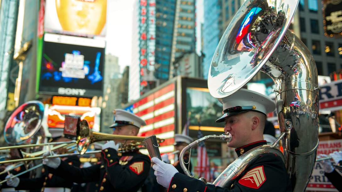 The Quantico Marine Corps Band, from Marine Corps Base Quantico, Virginia, performed at Times Square in New York City with more than 1,000 high school student for the Band of Pride Tribute Concert on November 10, 2014. The bands drew crowds of people who listened, rendered salutes, and took photos and video of the performance.