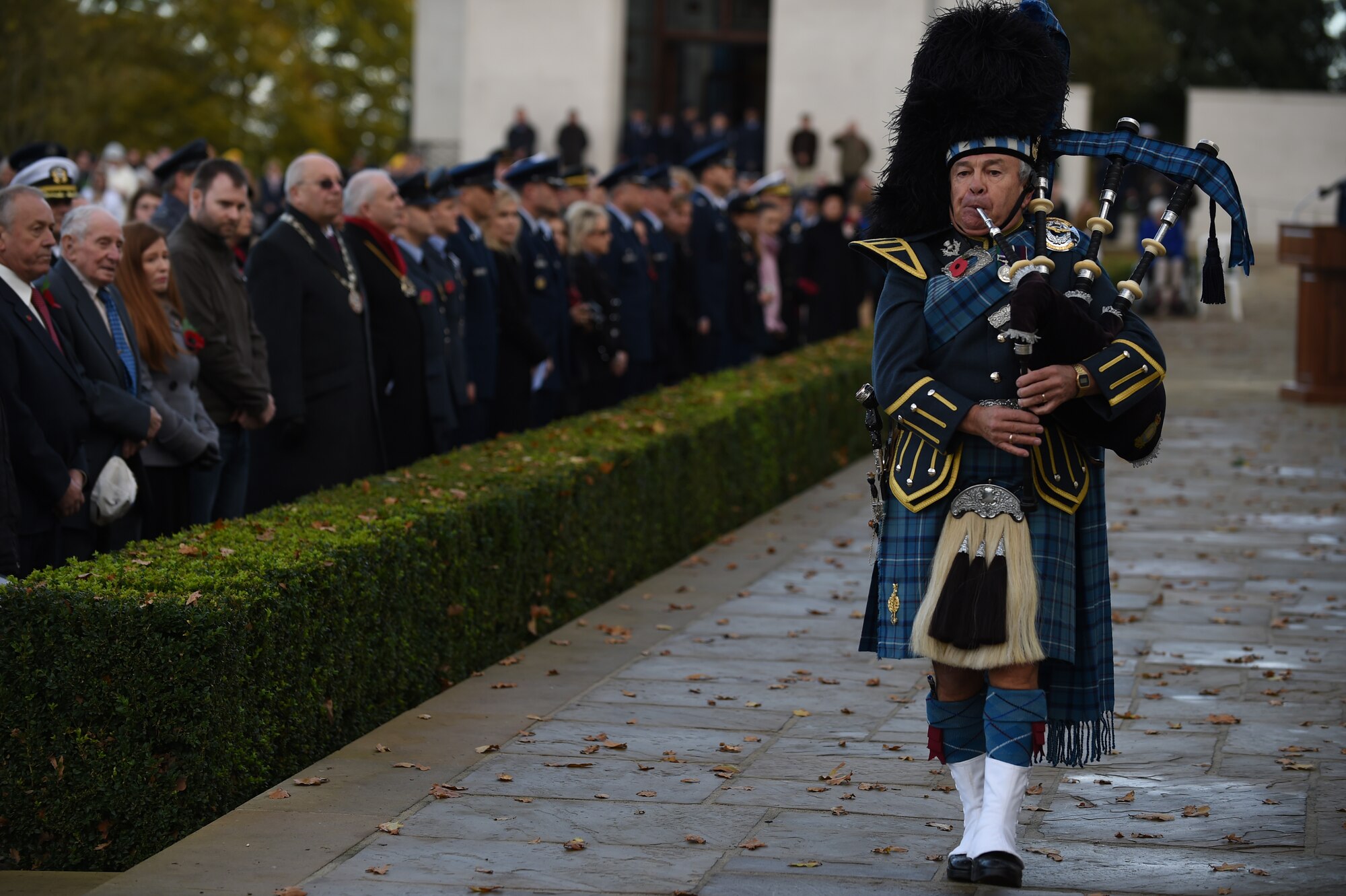 Retired Royal Air Force Warrant Officer Gary Kernaghan plays a bagpipe during a Veterans Day ceremony Nov. 11, 2014, at Cambridge American Cemetery, England. Since 1919, the United States has set aside Nov. 11 to remember the sacrifices of veterans past and present. (U.S. Air Force photo/Staff Sgt. Jarad A. Denton)