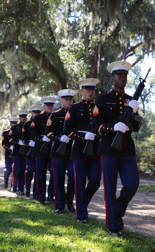 Marines with Truck Company, 23rd Marine Regiment, 4th Marine Division, march to the gravesite of Gen. Robert H. Barrow, 27th Commandant of the Marine Corps, during a wreath-laying ceremony at Grace Church of West Feliciana Cemetery in St. Francisville, La., Nov. 10, 2014.  The Marines performed a 21-gun salute after the Commander of Marine Forces Reserve, Lt. Gen. Richard P. Mills, laid a wreath on the late commandant's grave in remembrance of his service to the Corps and to the country. (U.S. Marine Corps Photo by GySgt. Katesha Washington/Released) 