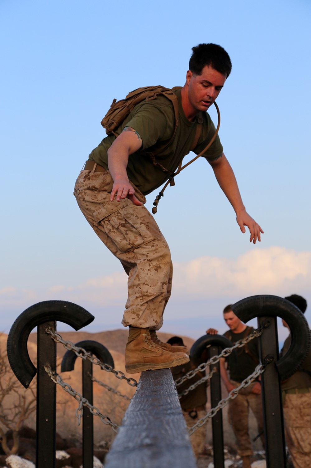 U.S. Marine Corps Staff Sgt. James R. Tandy, staff non-commissioned officer-in-charge with the Motor Transport Platoon, Headquarters and Service Company, Battalion Landing Team 2nd Battalion, 1st Marines, 11th Marine Expeditionary Unit (MEU), and native of  Tampa, Florida, maneuvers over an obstacle during physical conditioning on an endurance course as part of sustainment training at D’Arta Plage, Djibouti, Nov. 8. The 11th MEU is deployed as a theater reserve and crisis response force throughout U.S. Central Command and the U.S. 5th Fleet area of responsibility. (U.S. Marine Corps photos by 1st Lt. Colleen B. McFadden/Released)
