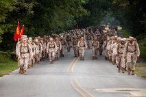 Marines and Sailors of the Chemical Biological Incident Response Force, II Marine Expeditionary Force, ascend during a hike aboard Naval Support Facility Indian Head. The unit has to maintain top physical condition in order to fulfill its 24-hour on-call mission to protect the nation's capital and areas across the globe. The conditioning hike is one of several completed during the calendar year.