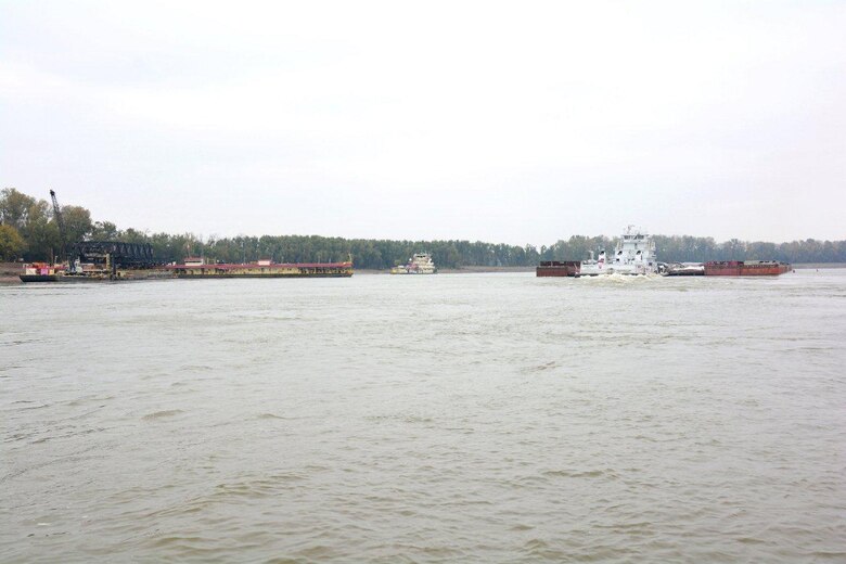 Fair Landing, Arkansas, Nov. 12, 2014 – Northbound commerce with as many as 49 barges moved through the restricted portion of the river at Fair Landing during daylight hours. This helps speed the clearing of the daily queue and reduces the wait time for southbound vessels. Work is also proceeding well in the narrowest reach of the restricted area and the Corps expects normal, unrestricted one-way traffic to resume after Monday, November 17, when the mat sinking unit completes its work in the narrow section and moves to a wider section of Fair Landing.  