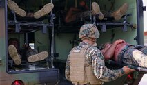 U.S. Navy Corpsmen load Marines with simulated combat injuries into an ambulance Nov. 6 at Camp Schwab, Japan, during exercise Blue Chromite 15. Blue Chromite demonstrates the Marine Corps’ expeditionary capabilities in the Pacific region. The Corpsmen participated in a mass casualty drill to experience simulated stress and chaos of a combat scenario. Sailors from 3rd Medical Battalion setup a shock trauma platoon in order to properly provide care to the casualties after the final assault. The Corpsmen are with 3rd Medical Battalion, 3rd Marine Logistics Group, III Marine Expeditionary Force. (U.S. Marine Corps Photo by Lance Cpl. Abbey Perria/Released)