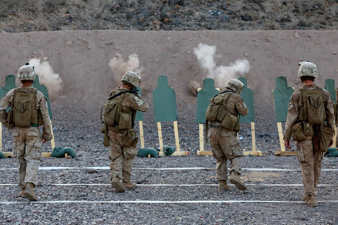 U.S. Marines with Fox Company, Battalion Landing Team 2nd Battalion, 1st Marines, 11th Marine Expeditionary Unit (MEU), fire on the move during a live-fire close-quarters tactics exercise as part of sustainment training at D’Arta Plage, Djibouti, Nov. 8. The 11th MEU is deployed to maintain regional security in the U.S. 5th Fleet area of responsibility. (U.S. Marine Corps photos by Gunnery Sgt. Rome M. Lazarus/Released)