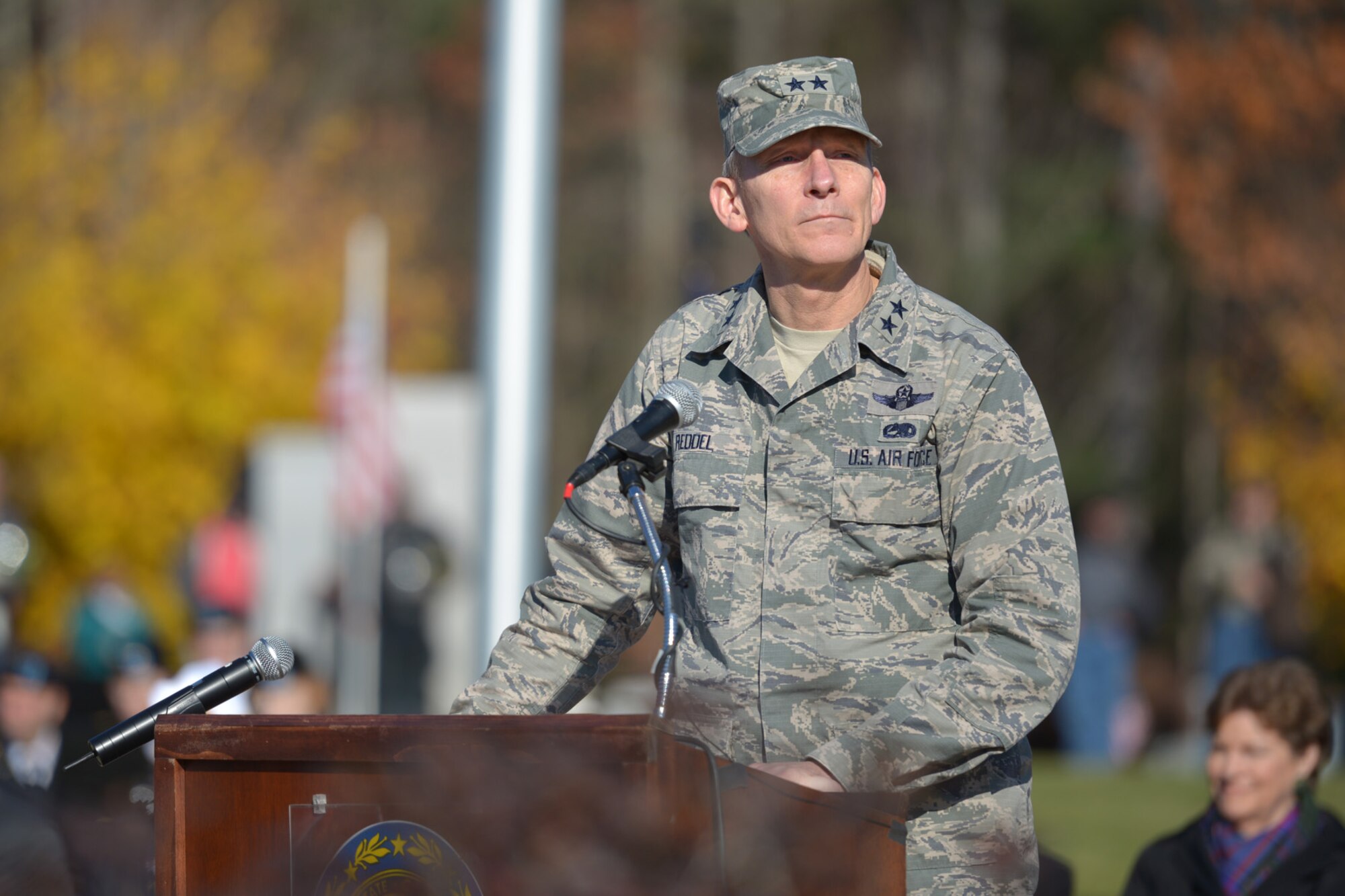Maj. Gen. William N. Reddel, the adjutant general, New Hampshire, delivers his welcoming remarks to visitors during the Veteran's Day Ceremony at the N.H. State Veterans Cemetery Nov. 11. The state’s senior military leader discussed the acts of kindness he has the opportunity to see towards veterans and members of the N.H. National Guard. (U.S. Air National Guard photo by Tech. Sgt. Mark Wyatt)