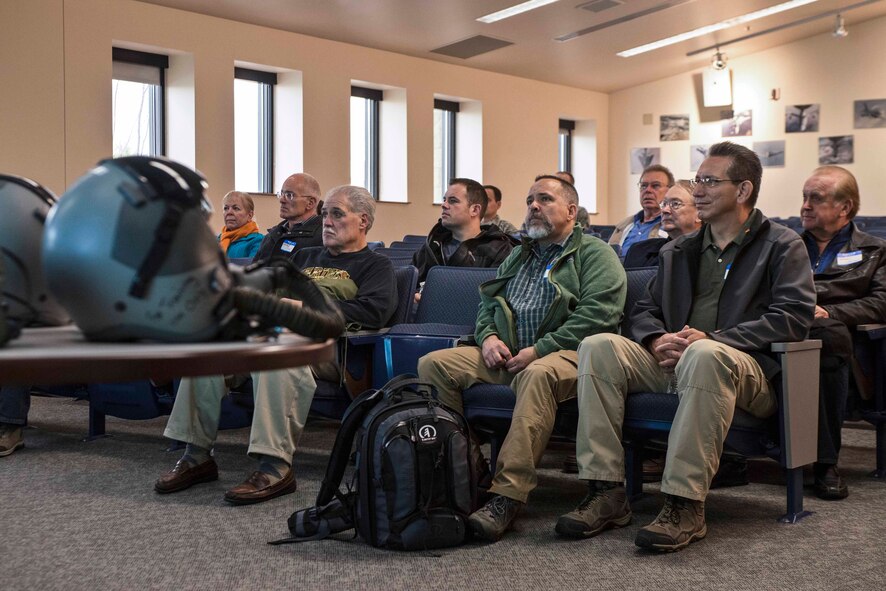 Fairchild honorary commanders listen to a brief from members of the 92nd Operations Group on their mission and individual units that support them Nov. 6, 2014, at Fairchild Air Force Base, Wash. Honorary commanders from several squadrons around the installation listened to multiple speakers talk about each of their unit’s duties.  (U.S. Air Force photo/Staff Sgt. Alexandre Montes)