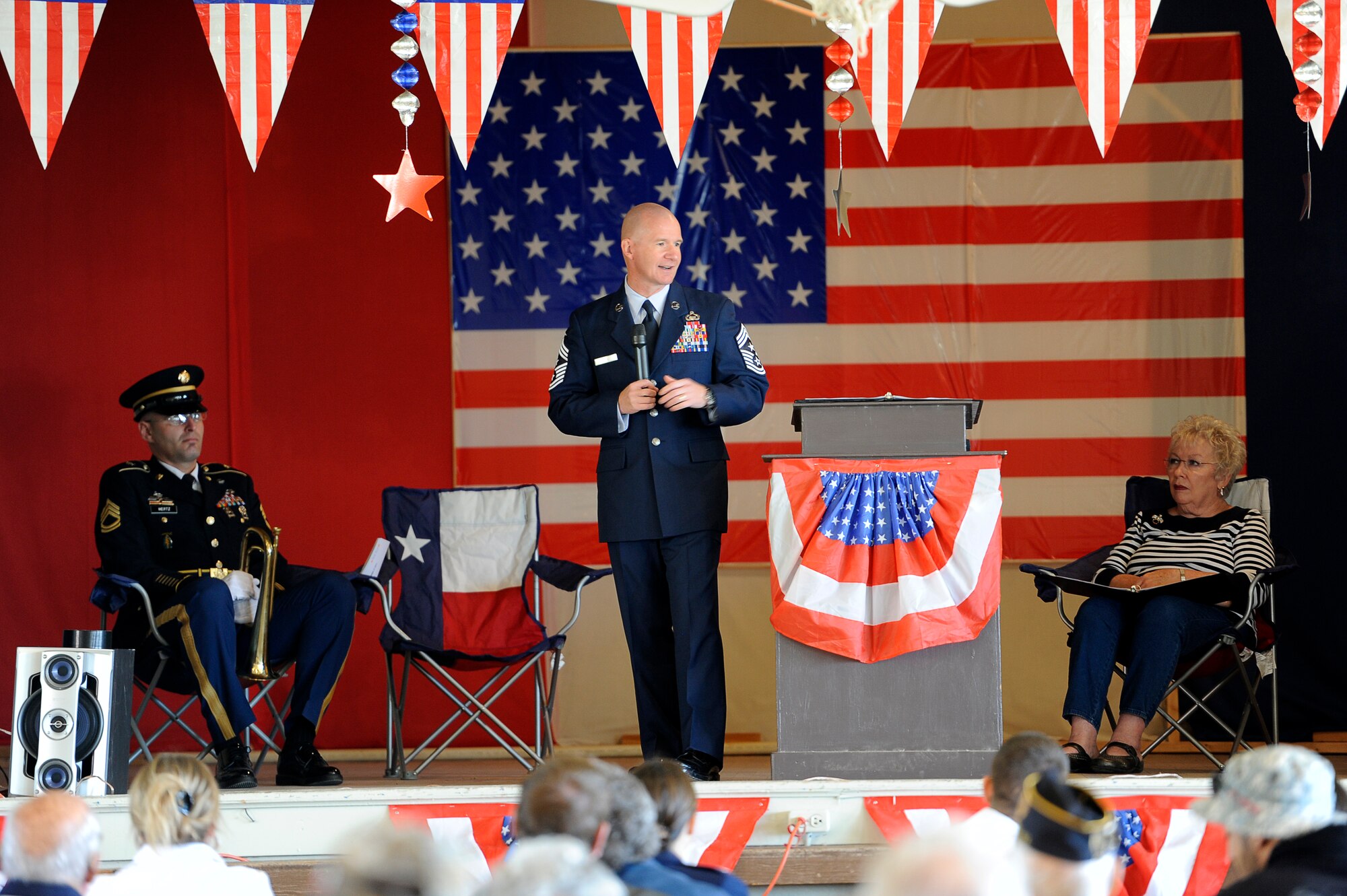 MILLERSVIEW, Texas – Chief Master Sgt. Thomas F. Good, 17th Training Wing Command Chief, gives a speech as the guest speaker at the town’s annual Veterans Day celebration Nov. 11. The Goodfellow Joint Service Color Guard and the active duty singing group Patriotic Blue also represented Goodfellow Air Force Base by participating in the ceremony. (U.S. Air Force photo/ Staff Sgt. Austin Knox)