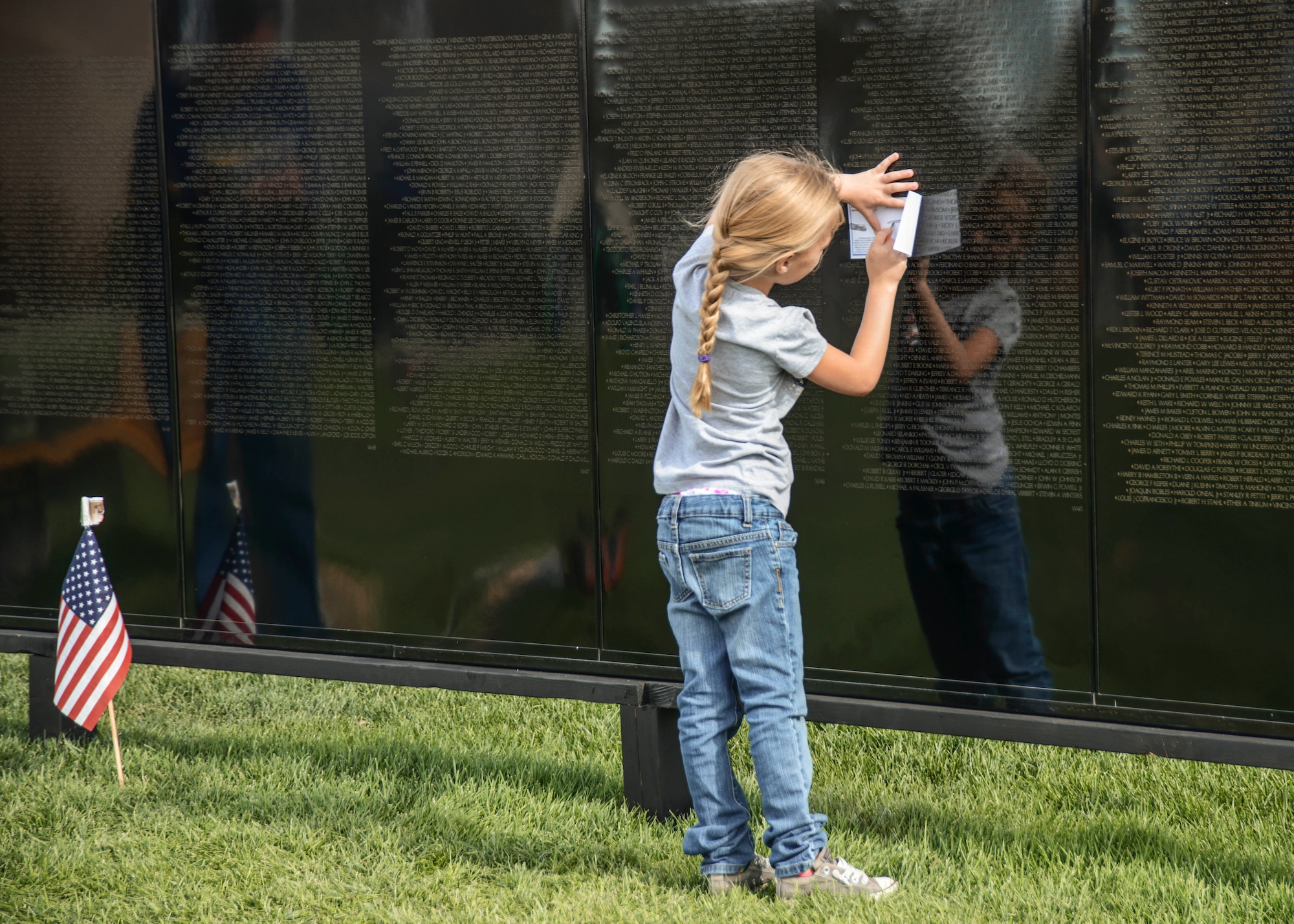 The 58,299 names on the Mobile Vietnam Veterans Memorial Wall are engraved, which allows visitors to obtain a pencil rubbing of the names of fallen servicemembers. (U.S. Air Force photo by Rebecca Amber)