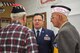 Chief Master Sgt. Dean Wilson, 366th Mission Support Group superintendent, talks with veterans during a Veterans Day ceremony held at the Veterans of Foreign Wars in Glenns Ferry, Idaho, Nov. 11, 2014. Veterans Day is a time to reflect on the contributions that past and present veterans have made in their service to the United States. (U.S. Air Force photo by 2nd Lt. Rebecca Solosabal/RELEASED)