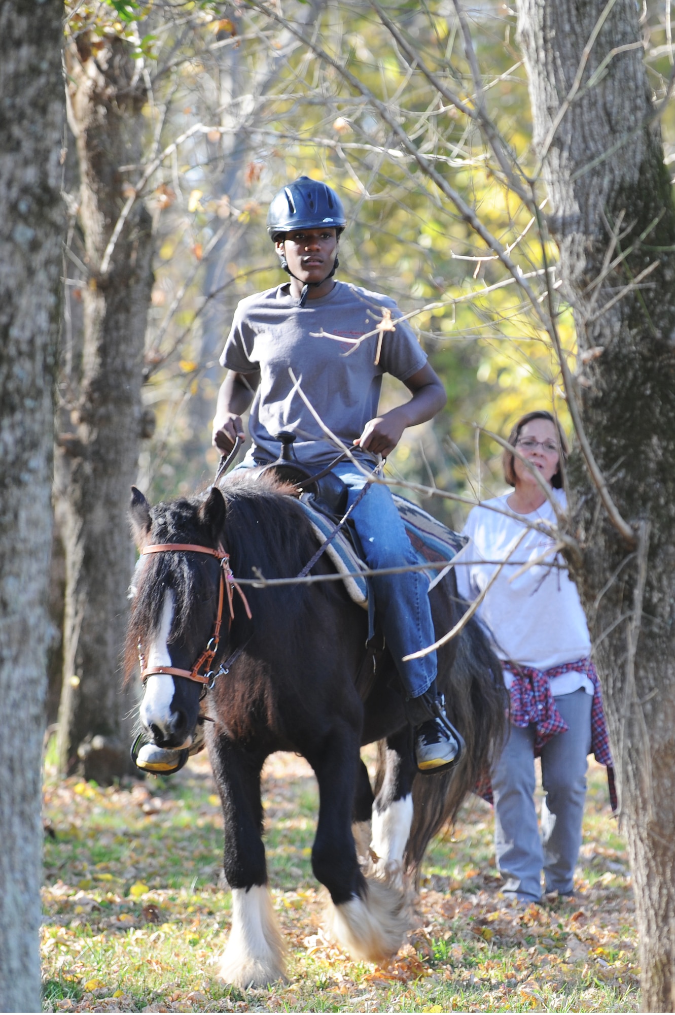 A veteran completes his first solo trail ride on a horse Oct. 10, 2014.   He is a participant in the third Equine-Assisted Therapy Veterans class. (U.S. Air Force photo/ Staff Sgt. Maria Bowman)