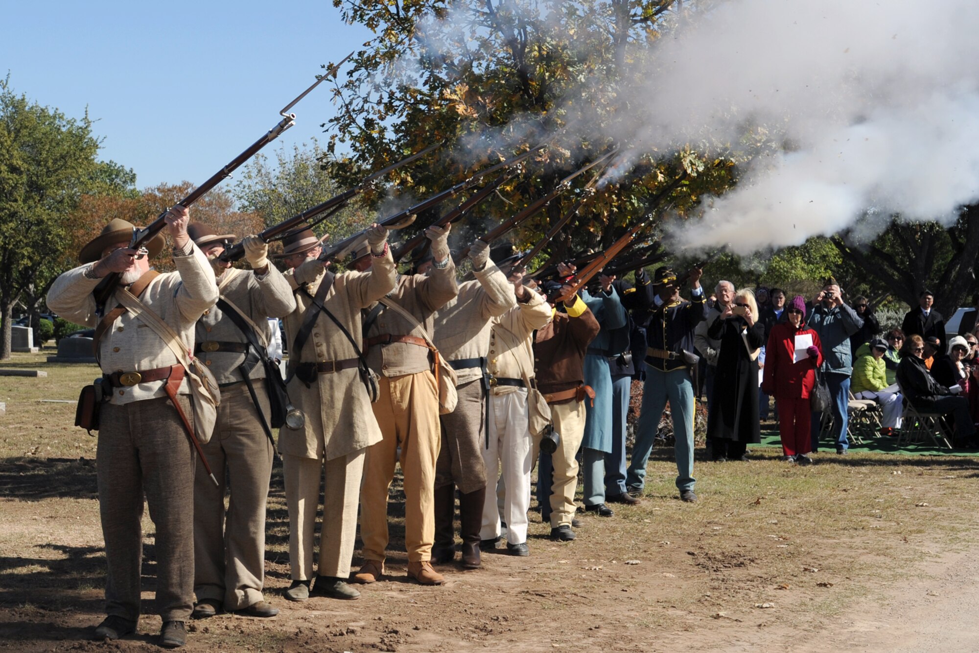 SAN ANGELO, Texas -- The Sons of Confederate Veterans fire volley shots during a Veterans Day ceremony at Fairmount Cemetery Nov. 11. The veterans laid to rest in the cemetery fought in wars throughout U.S. history to include Korea, Vietnam, the Civil War, the Indian Wars, the Mexican War and the Battle of San Jacinto. (U.S. Air Force photo/ Staff Sgt. Laura R. McFarlane)