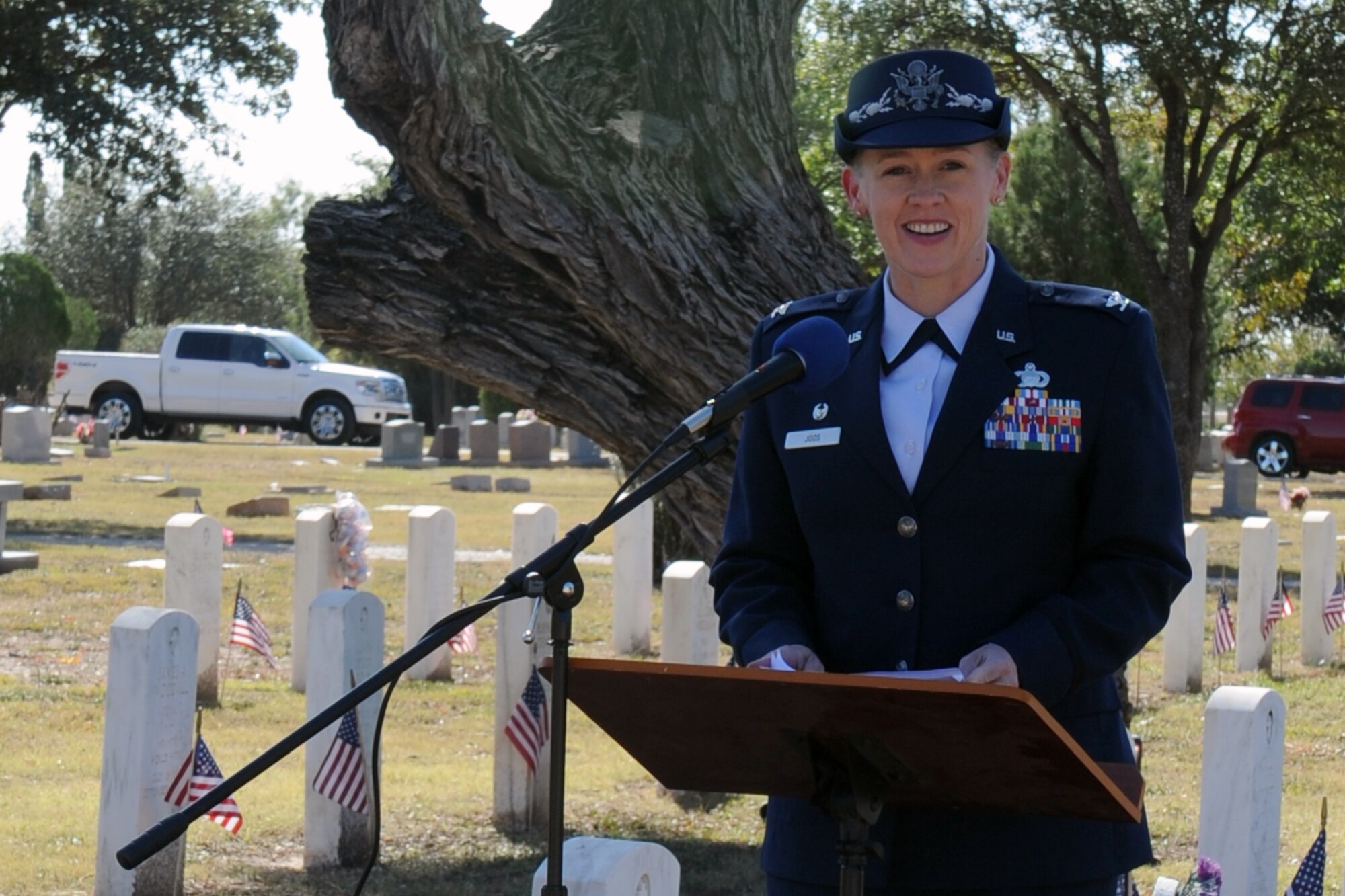 SAN ANGELO, Texas -- Col. Kimberlee P. Joos, 17th Training Wing Commander, addresses the audience during a Veterans Day ceremony at Fairmount Cemetery Nov. 11. Joos highlighted the difference between Memorial Day and Veterans Day which honors all veterans. (U.S. Air Force photo/ Staff Sgt. Laura R. McFarlane)