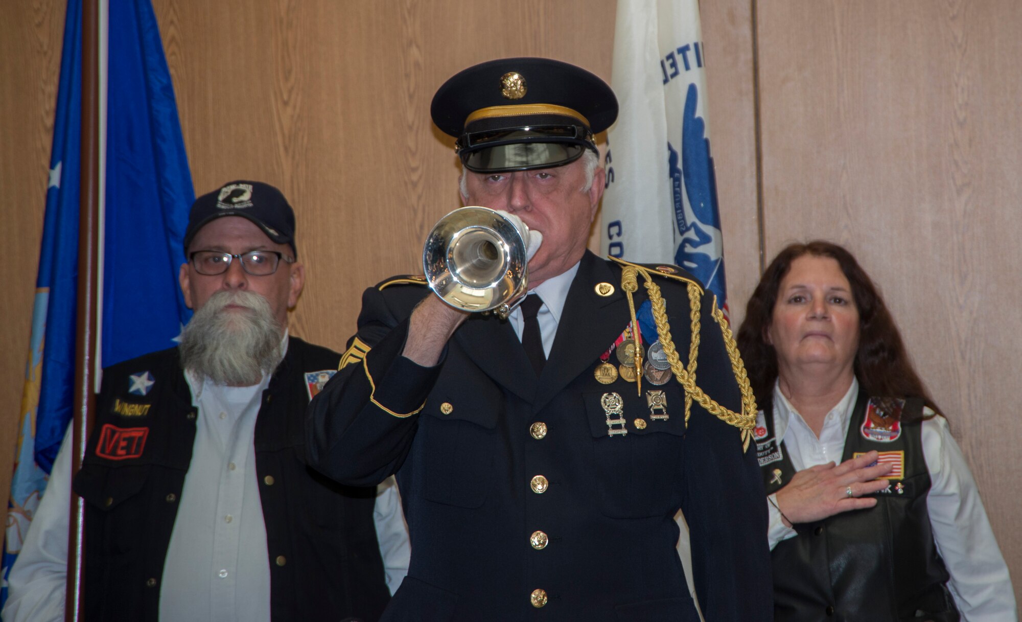 Retired from the U.S. Army, Larre Robertson plays taps during a Veterans Day ceremony held at the Idaho State Veterans Home in Boise, Idaho, Nov. 11, 2014. This date became a legal federal holiday in the United States in 1938 to honor its past and present veterans.  (U.S. Air Force photo by Staff Sgt. Roy Lynch/RELEASED)