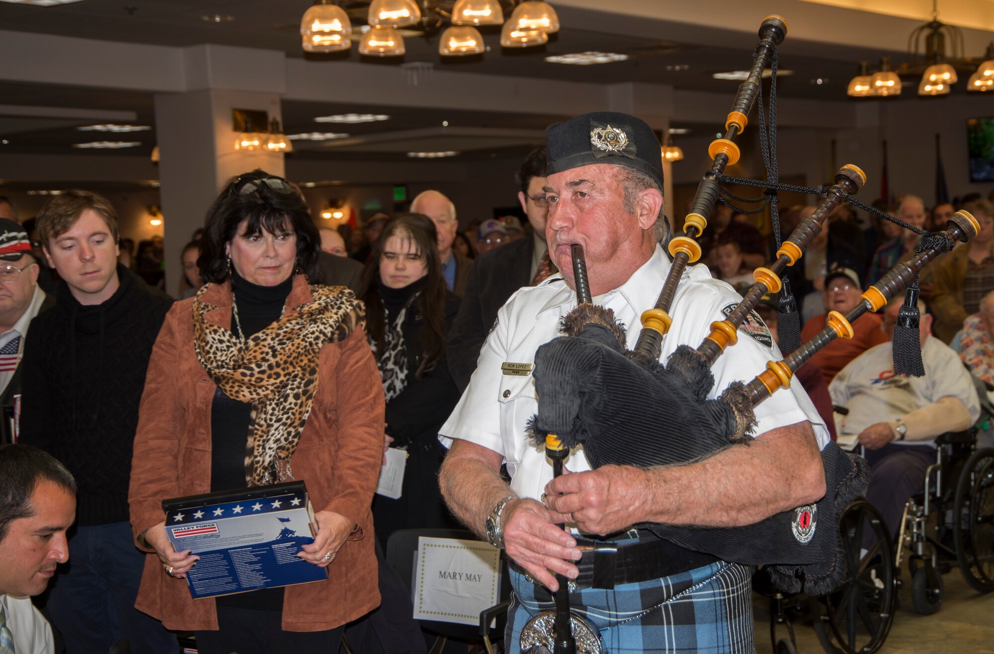 Ron Lopez, Boise Highlanders, plays the bagpipes during a Veterans Day ceremony held at the Idaho State Veterans Home in Boise, Idaho, Nov. 11, 2014. Veterans Day originated from the signing of an armistice or truce November 11, 1918, at 11 a.m., when all fighting ceased between the Allied nations and Germany, effectively ending World War I. It was the 11th hour of the 11th day of the 11th month.  (U.S. Air Force photo by Staff Sgt. Roy Lynch/RELEASED)