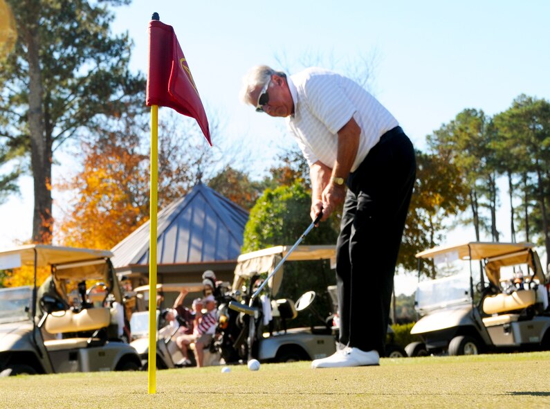 A retired veteran practices his putting at the Atlanta Athletic Club in John’s Creek, Ga., Nov. 10, 2014. The AAC hosted a Veteran’s Golf Tournament for club members and current servicemembers on their Riverside course, ranked as one of the top private courses by Golf Digest. (U.S. Air Force photo by Senior Airman Daniel Phelps/Released)