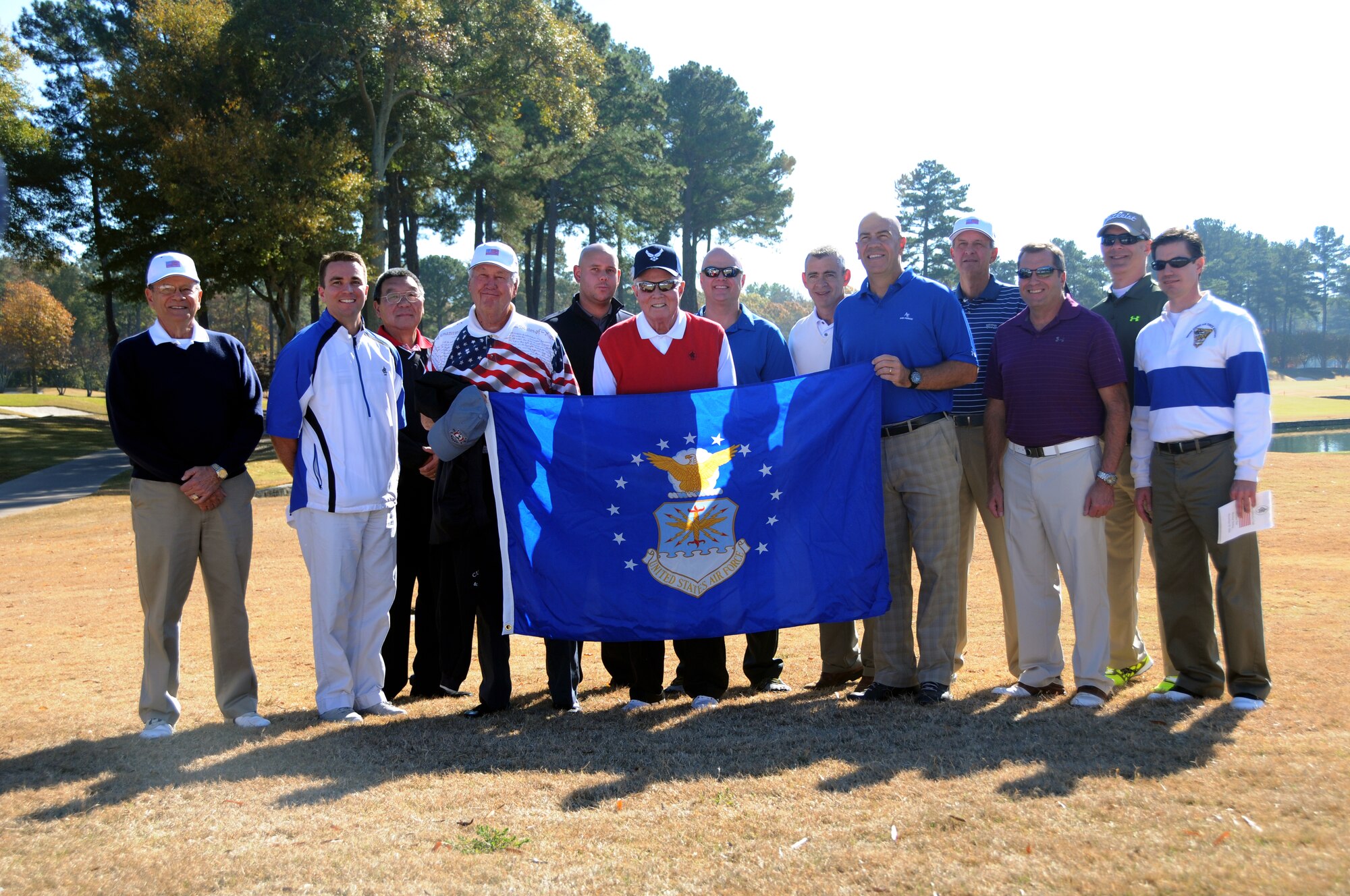 Airmen past and present pose for a photo at the Atlanta Athletic Club in John’s Creek, Ga., Nov. 10, 2014. The AAC hosted a Veteran’s Golf Tournament for club members and current servicemembers on their Riverside course, ranked as one of the top private courses by Golf Digest. (U.S. Air Force photo by Senior Airman Daniel Phelps/Released)