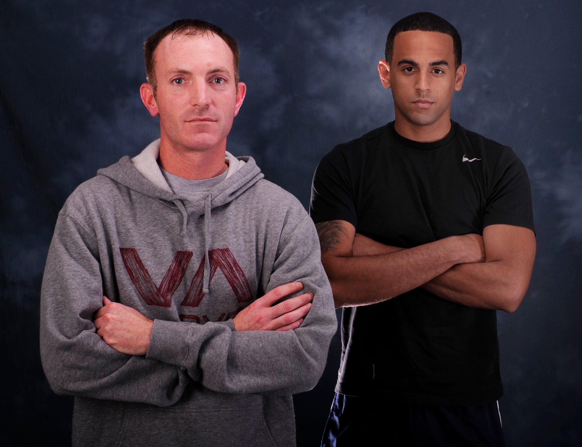 Master Sgt. Troy Thornton, 325th Logistic Readiness Squadron fuels operation section chief, and Senior Airman Kenneth Houston, 325th LRS fuels distribution operator, stand for a photo Nov. 7. Both Airmen competed to see who could run the most miles during the month of October, accumulating more than 400 miles combined. (U.S. Air Force photo by Airman 1st Class Sergio A. Gamboa)