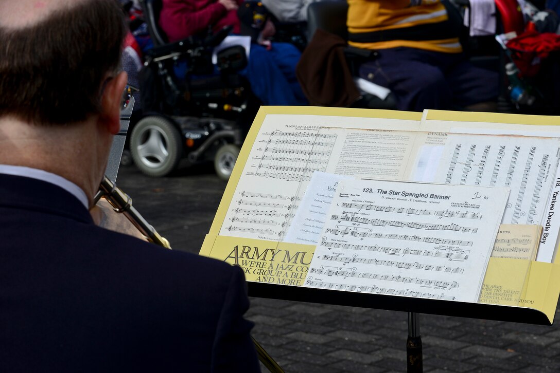 A member of the Braxton-Perkins Post 25 Brass Ensemble performs the “Star Spangled Banner” during a Veteran’s Day ceremony at the Victory Arch in Newport News, Va., Nov. 11, 2014. The ensemble played various patriotic pieces throughout the ceremony. (U.S. Air Force photo by Senior Airman Kimberly Nagle/Released) 