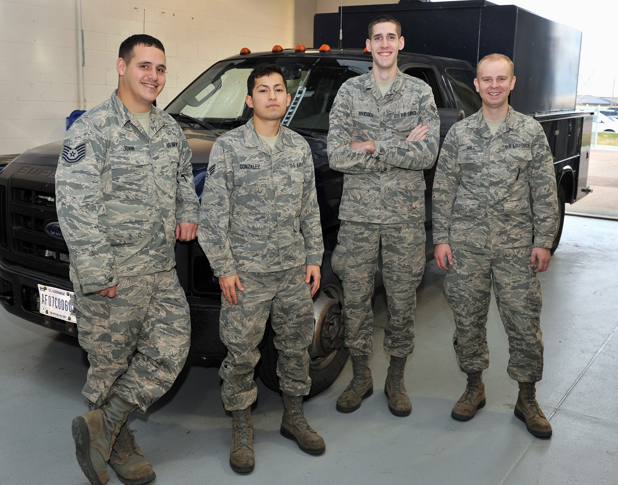 Members of the 341st Maintenance Group’s inaugural Survivable Systems Team pose for a photograph Oct. 31 at their work center in Bldg. 1439. Shown from left to right are Tech. Sgt. Robert Jovin, team trainer and team chief; Senior Airman Joe Gonzalez; Airman 1st Class Austin Bridges; and Airman 1st Class Joseph Hall. All are assigned to the 341st Maintenance Operations Squadron, though SST operates as part of the 341st Missile Maintenance Squadron. The SST was created as an Air Force Global Strike Command Force Improvement Program initiative to focus on launch control center maintenance. (U.S. Air Force photo/ John Turner)