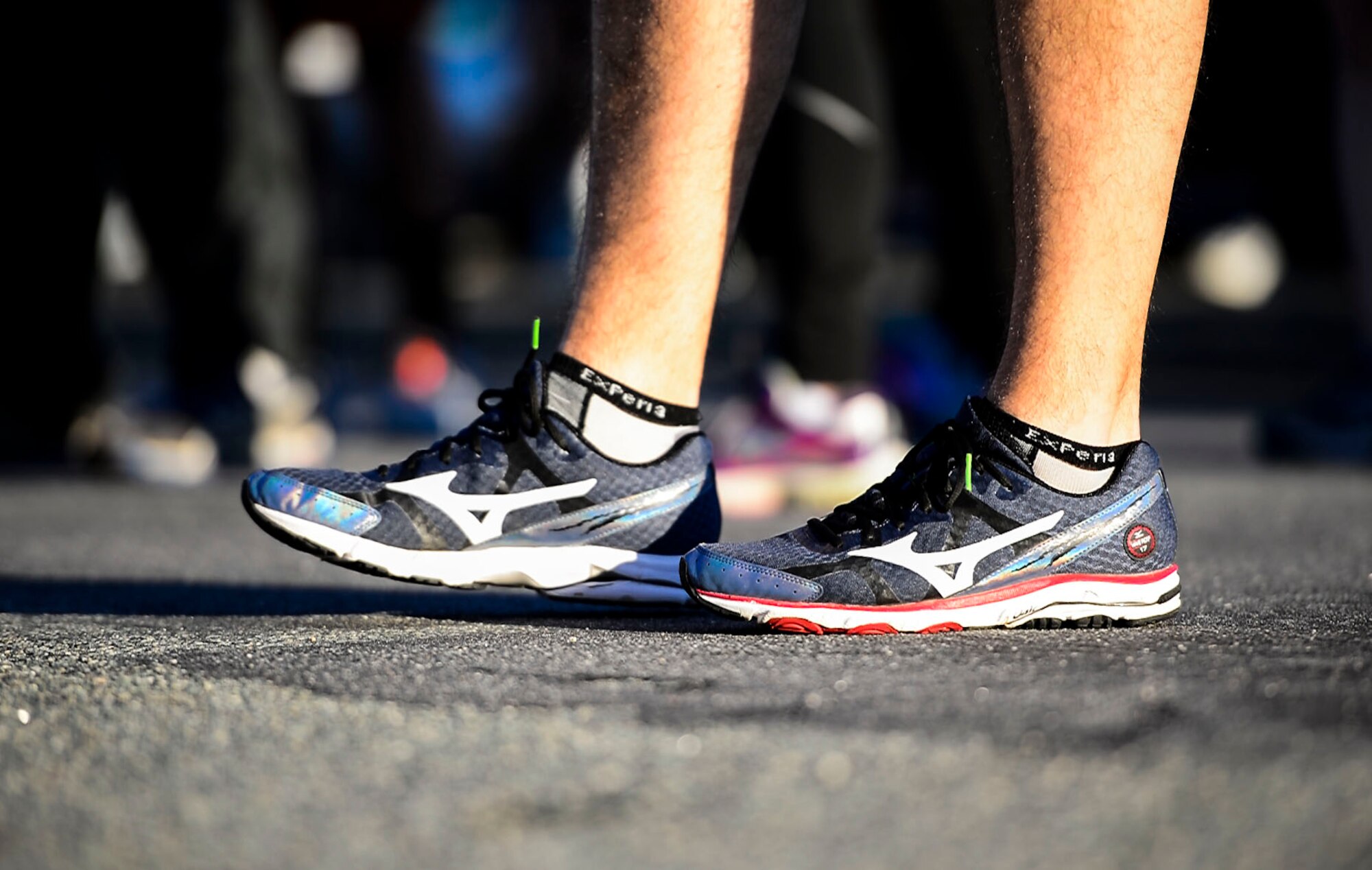 A runner prepares for the Operation Warmheart 5k food run at Langley Air Force Base, Va., Nov. 7, 2014. Runners brought canned goods and monetary donations to help proceeds for Operation Warmheart, which will be putting together holiday baskets for U.S. Air Force Airmen and their families. (U.S. Air Force photo by Senior Airman Kayla Newman/Released)