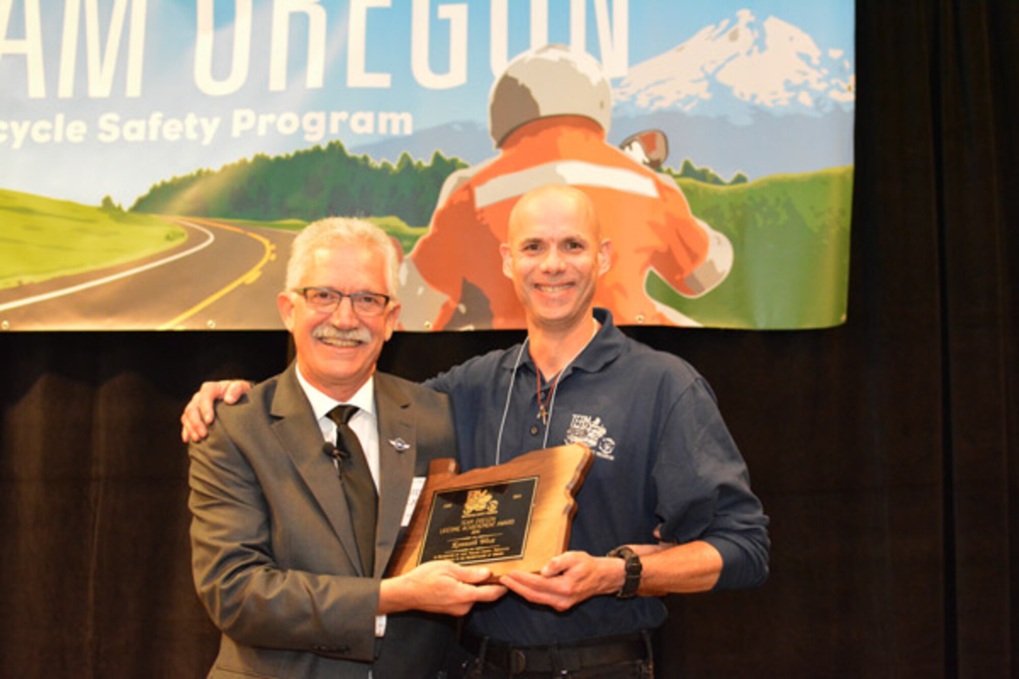 Ken West being honord by Director Steve Garets