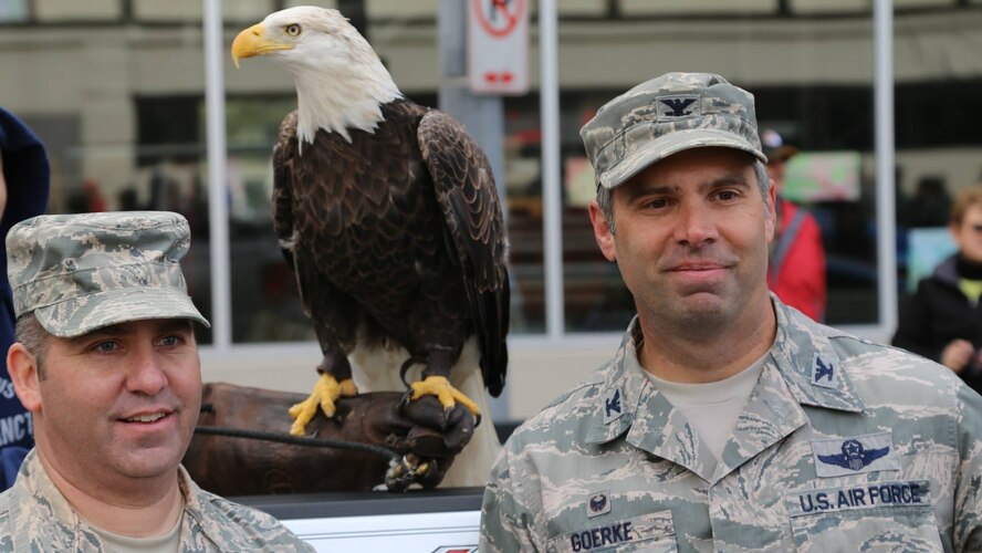 Recruiter Tech. Sgt. Paul Condor, and the commander of the 932nd Airlift Wing, Col. Karl Goerke, spent time thanking veterans and the public at the 31st annual St. Louis Veterans Parade.  Patriotic American Airmen of the 932nd Airlift Wing from Scott Air Force Base, paid tribute to veterans at the downtown parade and met the Great American Bald Eagle before the event started. (U.S. Air Force photo/Maj. Stan Paregien)