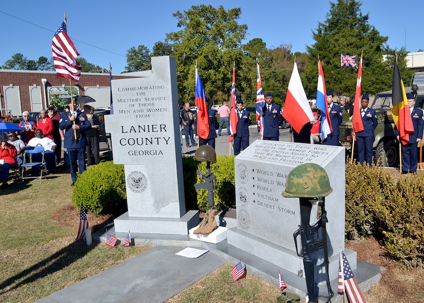 Moody Airmen serve as flag bearers during a Veterans Day ceremony Nov. 11, 2014, in Lakeland, Ga.  The event recognized veterans from all services, including Lakeland residents in their 90s who served in World War II.  (U.S. Air Force photo by Master Sgt. Sonny Cohrs/Released)