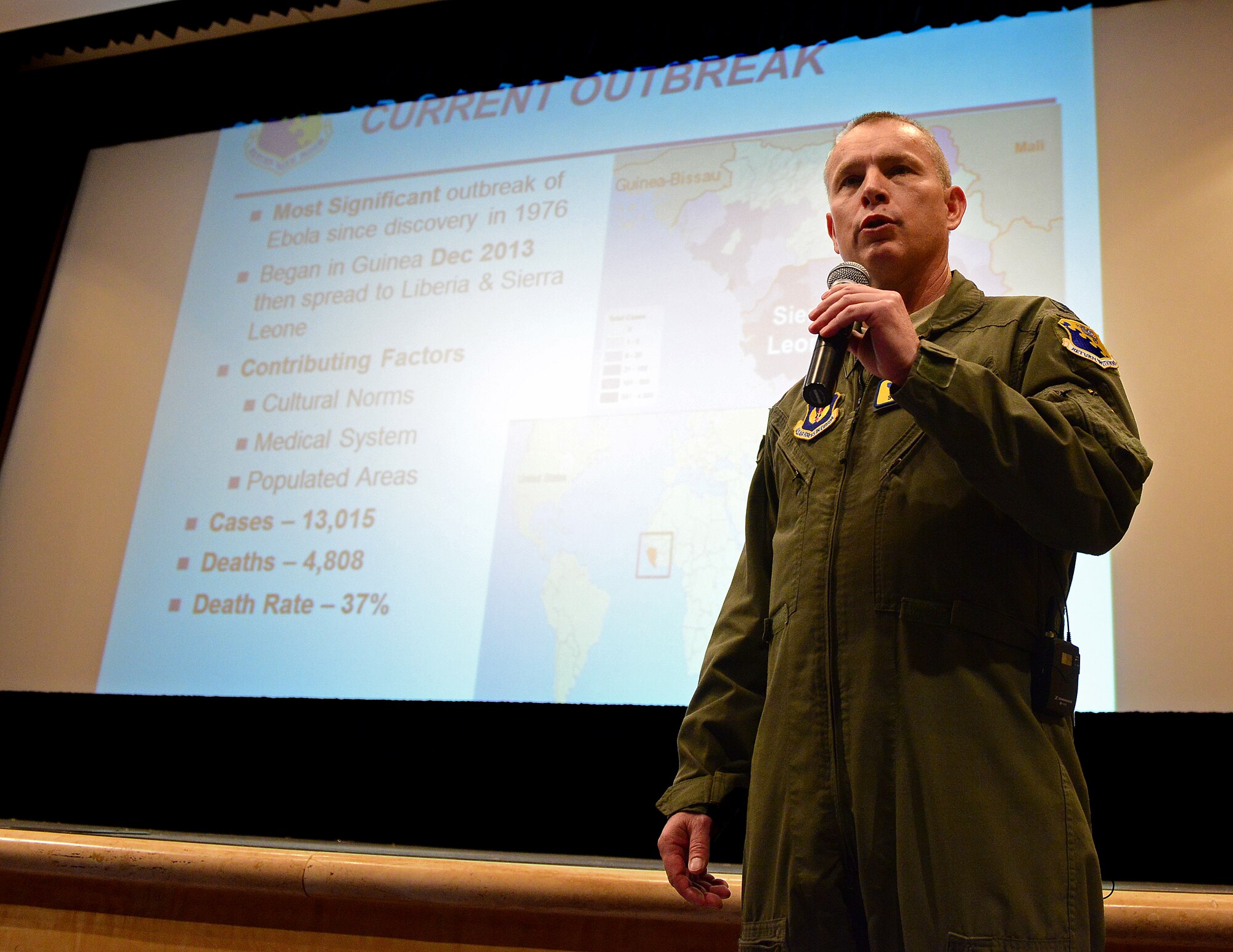 Col. Scott Price, 31st Aerospace Medicine Squadron chief and public health emergency officer, speaks to Aviano members during a town hall, Nov. 7, 2014, at Aviano Air Base, Italy. Airmen, their families, and local Italian nationals attended the town hall to enhance understanding of the Ebola virus. (U.S. Air Force photo/Senior Airman Matthew Lotz)