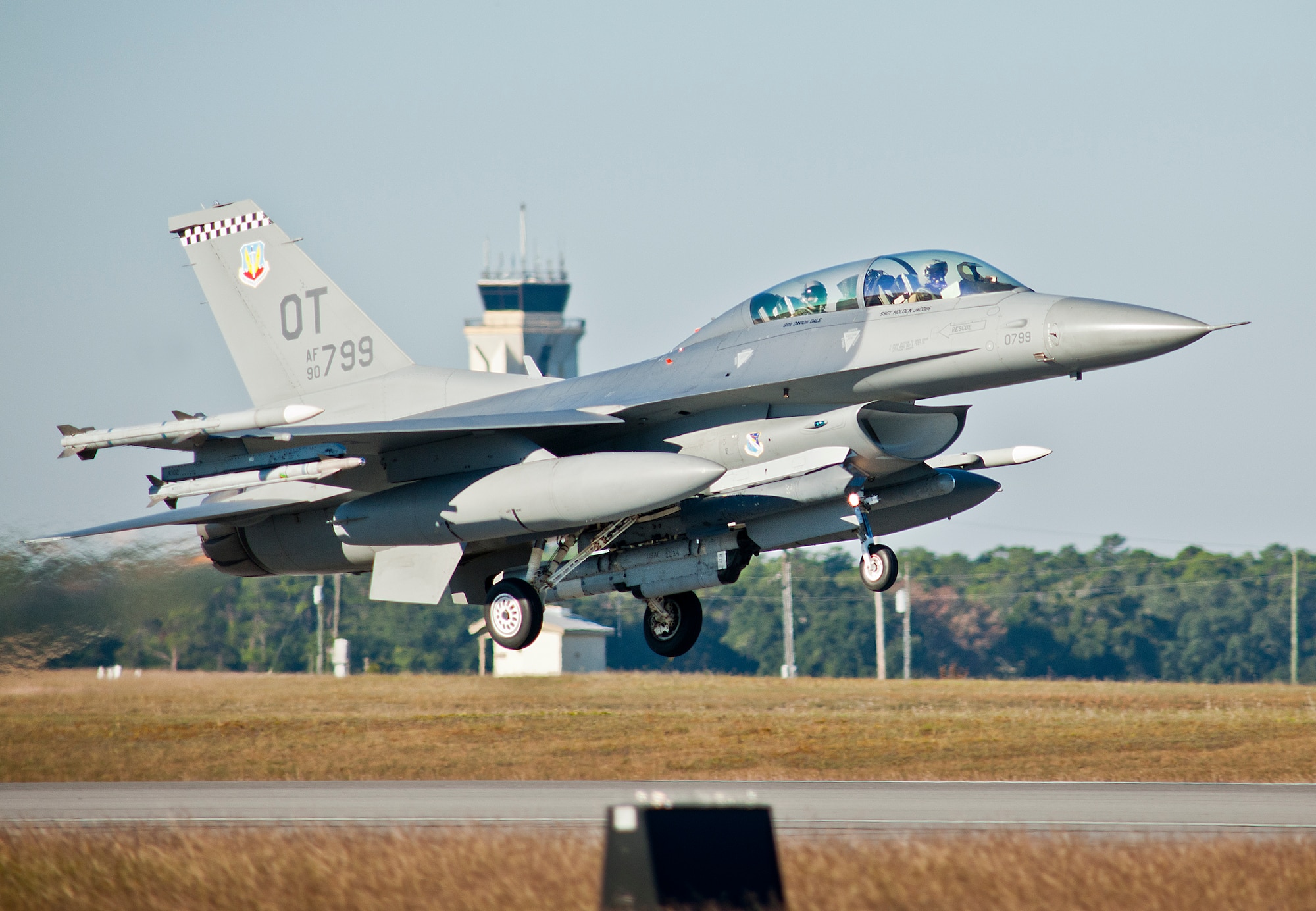 An 85th Test and Evaluation Squadron F-16 Fighting Falcon lifts off from the Eglin Air Force Base runway for a morning sortie.  The 85th TES Airmen fly operational test missions in the F-16 and F-15. The 85th TES is a squadron in the 53rd Wing. (U.S. Air Force photo/Samuel King Jr.)