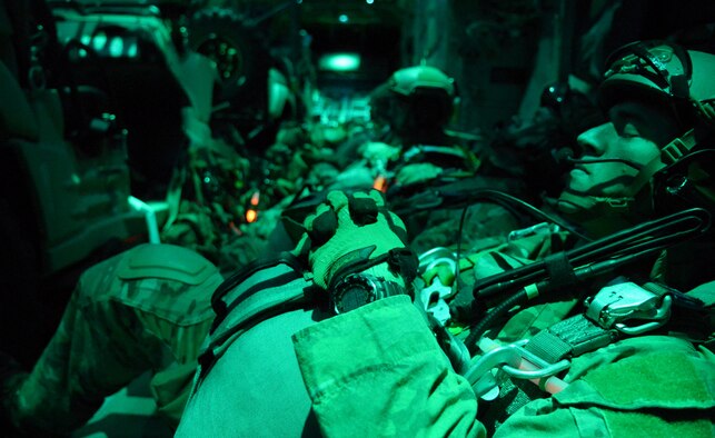 A combat controller from the 321st Special Tactics Squadron mentally prepares prior to jumping into a simulated target Nov. 6, 2014, during a training mission at RAF Sculthorpe in Norwich, England. During the mission, Air Commandos searched for simulated potential threats and rescued simulated hostages in the training area. (U.S. Air Force photo by Airman 1st Class Dillon Johnston/Released)