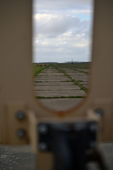 An MC-130J Commando II from the 67th Special Operations Squadron awaits inbound aircraft in order provide JP-8 fuel during a forward area refueling point mission Nov. 5, 2014, at RAF Sculthorpe in Norwich, England. FARP supplies enough JP8 to an aircraft in need of fuel in order for them to reach a safe destination. This training is crucial for aircraft in forward deployed locations without the benefit of base fuel points. (U.S. Air Force photo by Tech. Sgt. Stacia Zachary/Released)