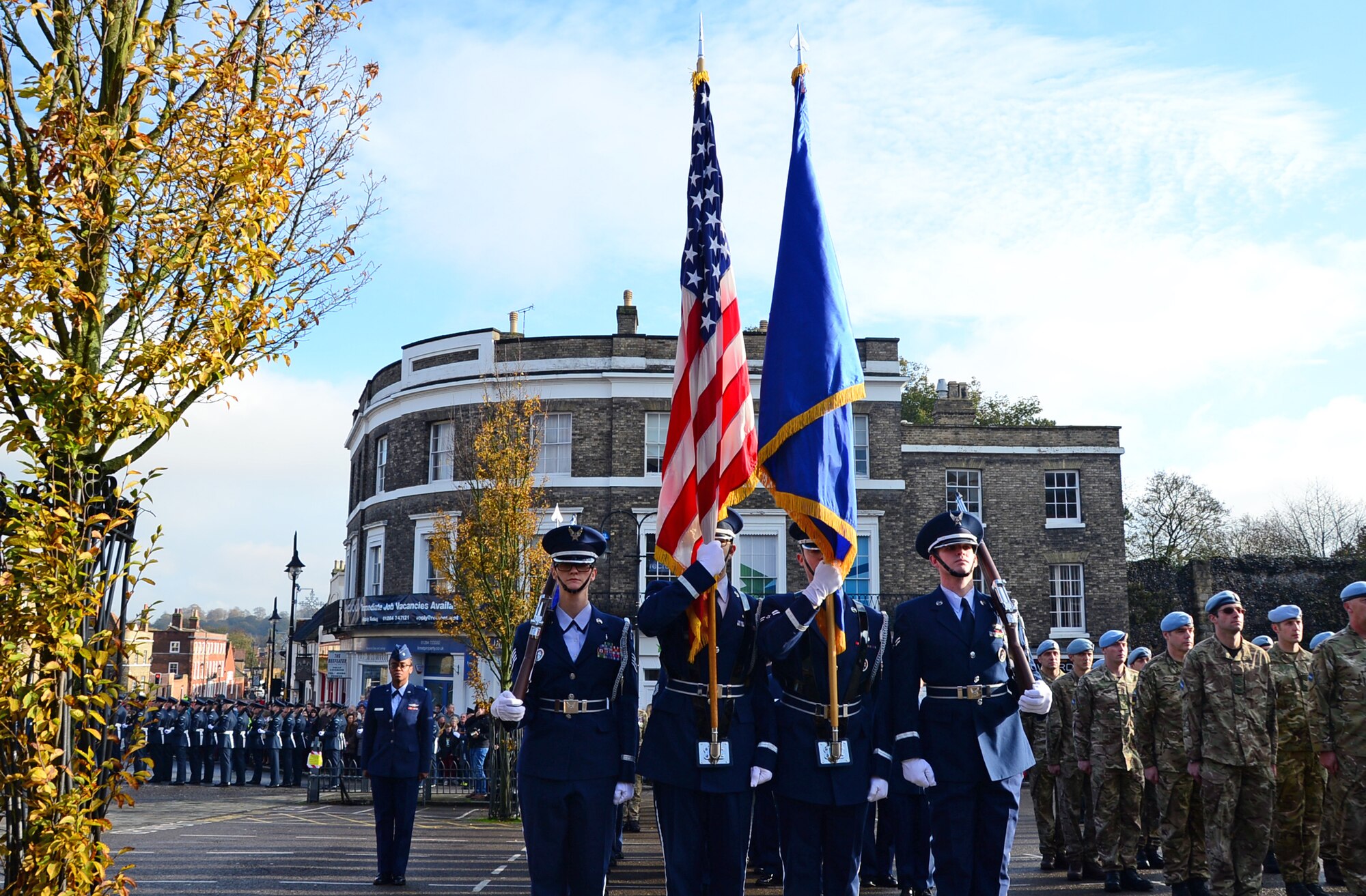 Airmen from the 48th Fighter Wing Honor Guard participate in the Remembrance Day ceremony on Angel Hill in Bury St. Edmunds, England, Nov. 9, 2014. Airmen from RAFs Lakenheath and Mildenhall participated in the ceremony by laying poppy wreaths to show their support and reverence to fallen heroes. (U.S. Air Force photo by Senior Airman Erin O’Shea/Released) 