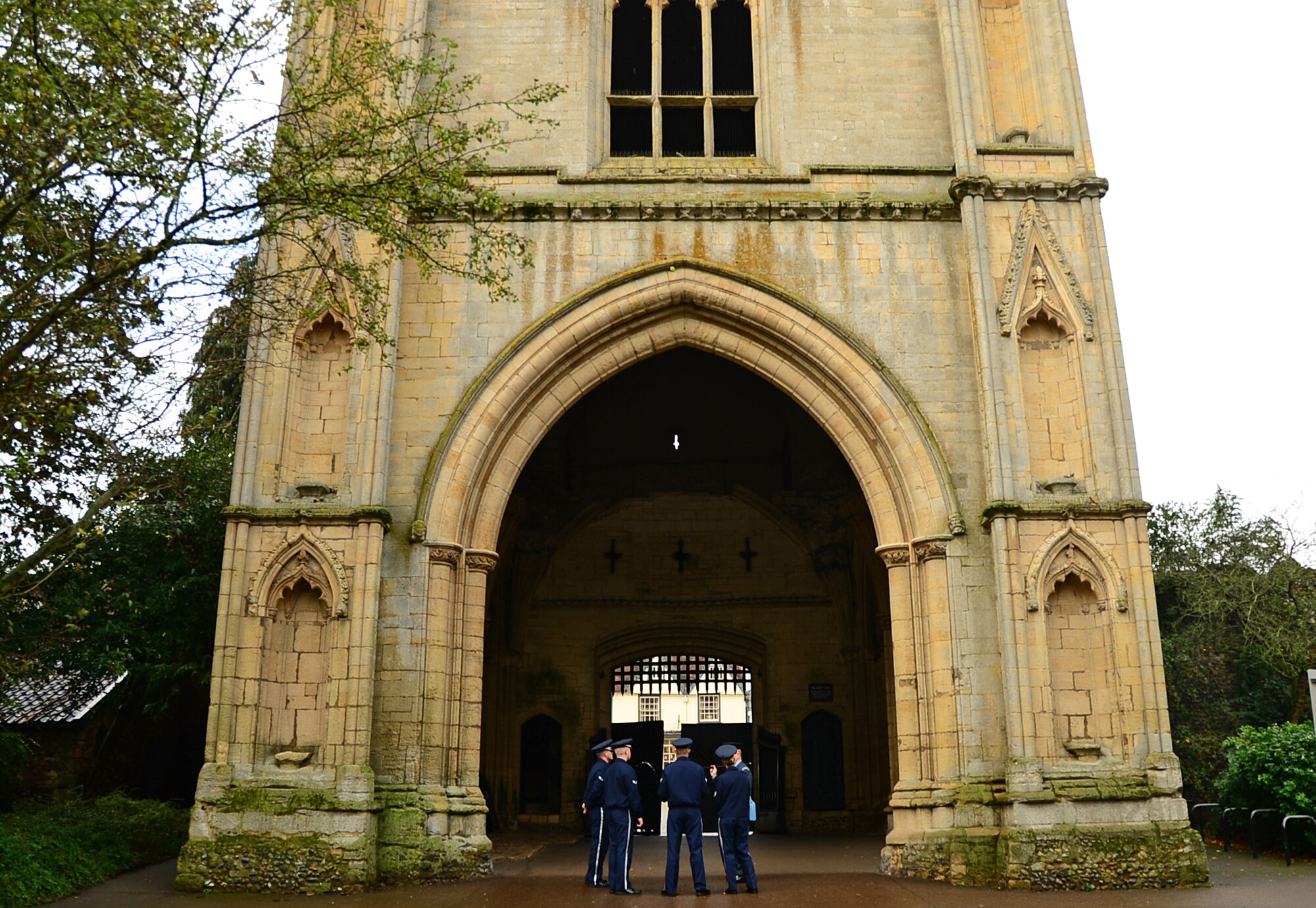 Airmen from the 48th Fighter Wing Honor Guard gather outside the Abbey Gardens to prepare for the Remembrance Day ceremony in Bury St. Edmunds, England, Nov. 9, 2014. Airmen from RAFs Lakenheath and Mildenhall participated in the ceremony by laying poppy wreaths to show their reverence to fallen heroes. (U.S. Air Force photo by Senior Airman Erin O’Shea/Released) 