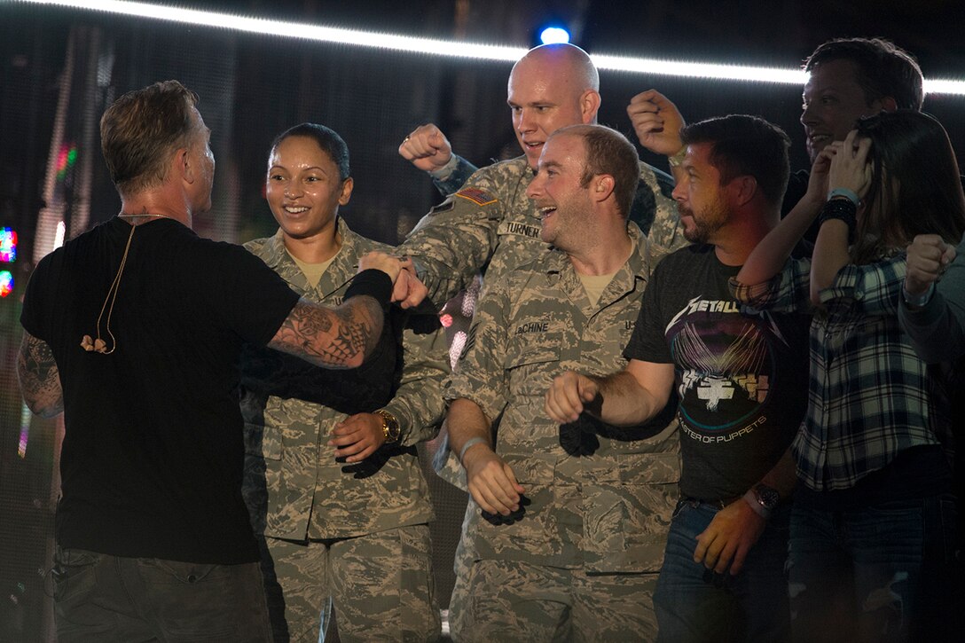 Metallica’s James Hetfield thanks service members after bringing them on stage during a performance at the the Concert for Valor in Washington, D.C., Nov. 11, 2014. 