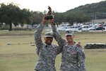 Staff Sgt. Melvyn Mayo and Sgt. 1st Class Vinicios Occhiena placed first at the 2014 Best Medic Competition.  