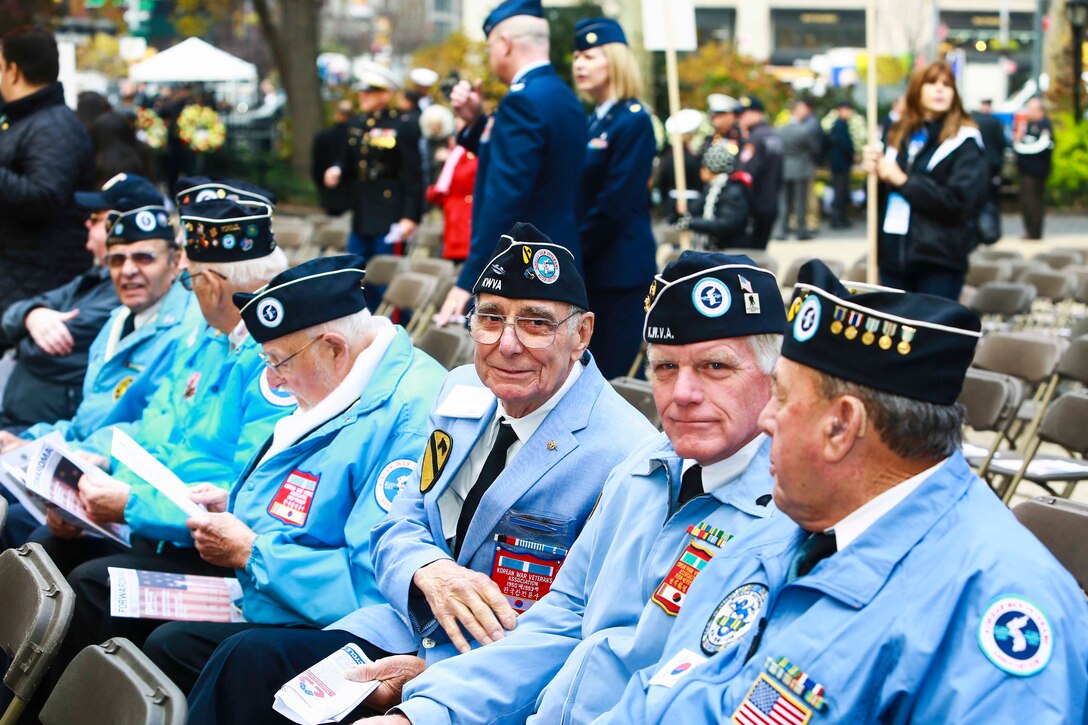 Veterans of the Korean War wait for the start to Opening Ceremony of the 95th Annual New York City Veterans Day Parade, also known as America's Parade in Manhattan, N.Y. Nov. 11, 2014. In addition to the parades service members, more than 6,000 people were in attendance. (U.S. Marine Corps photo by Cpl. Elizabeth Thurston/Released)