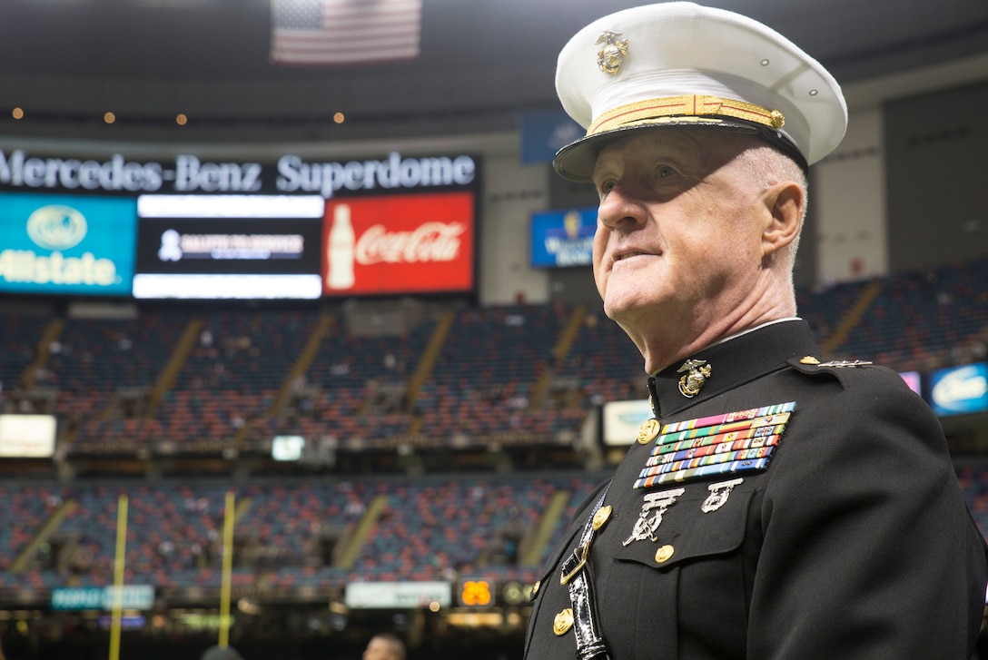 Lt. Gen. Richard P. Mills, commander of Marine Forces Reserve, watches a presentation during the Veteran Salute day prior to the New Orleans Saints game at the Mercedes-Benz Superdome in New Orleans, Nov. 9, 2014. Veteran Salute day is part of the National Football League’s annual Salute to Service campaign in which, throughout the month, teams designate one home game to honor the military.